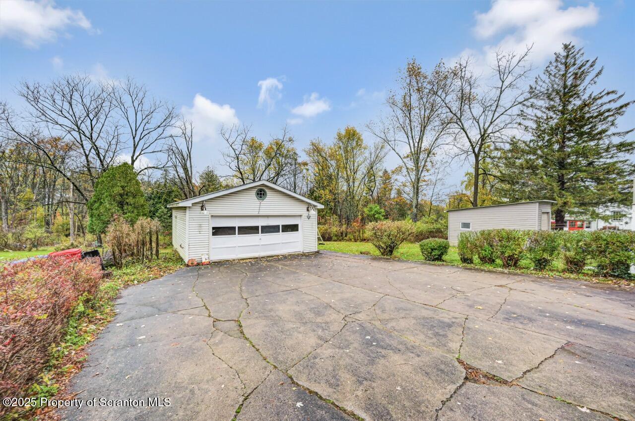 216 North Abington Road Clarks Green, PA 18411 - Photo 65 of 71 a view of a house with a yard and large trees