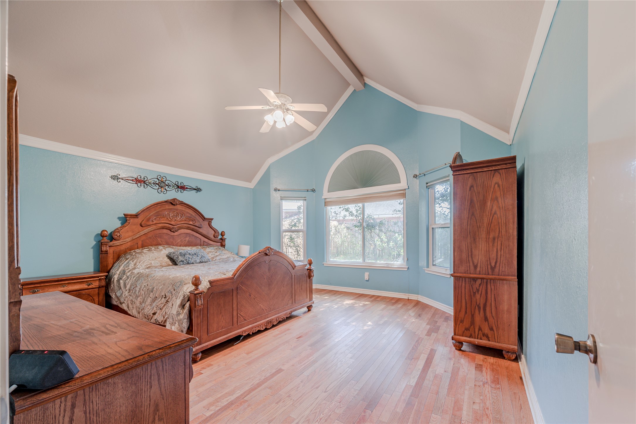 7714 Broken Arrow Street Baytown, TX 77521 - Photo 20 of 41 a living room with furniture and a wooden floor