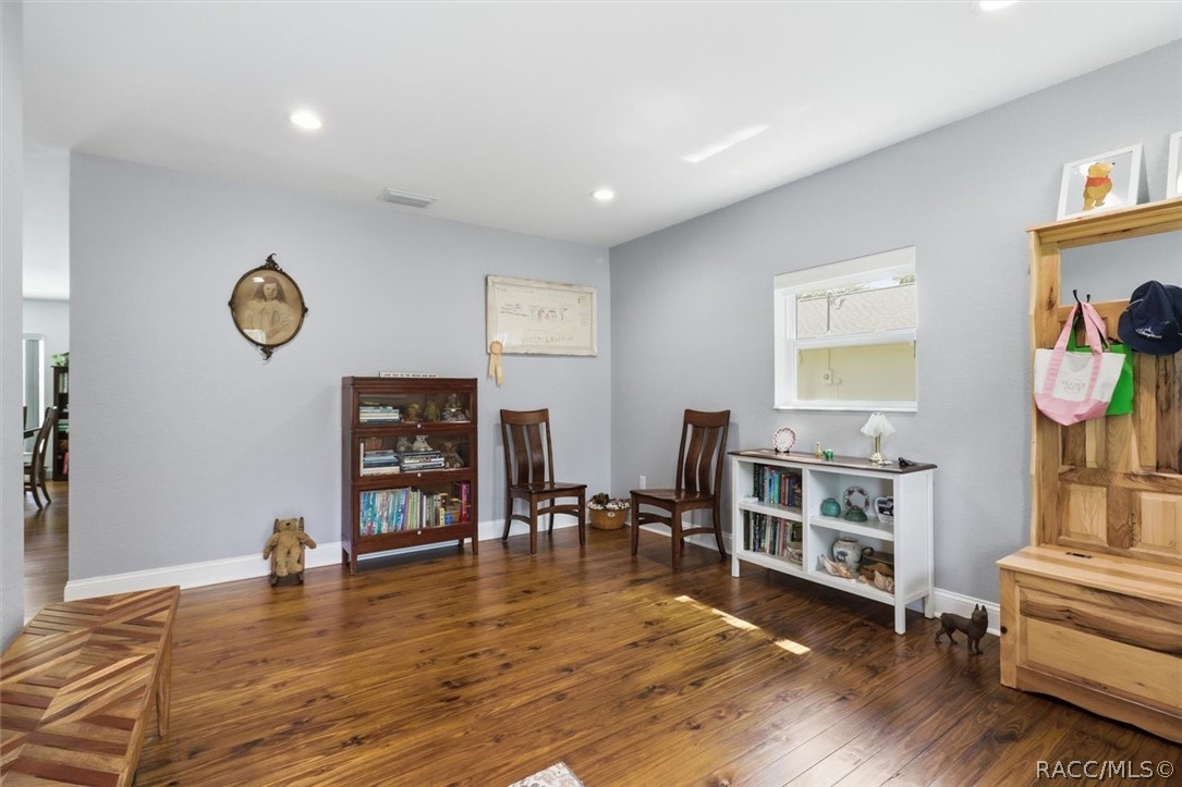 4099 West Ridge Court Dunnellon, FL 34433 - Photo 13 of 49 Better view of this Bonus room at entrance of home with multiple uses? Newer drywall, recessed lighting and windows!