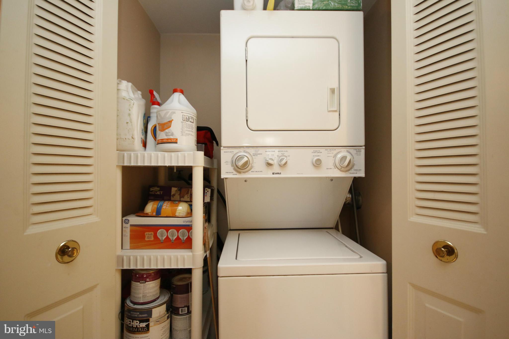 2210 Castle Rock Square, Unit 1B Reston, VA 20191 - Photo 20 of 26 a utility room with dryer and washer