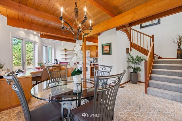 a view of a livingroom with furniture and window