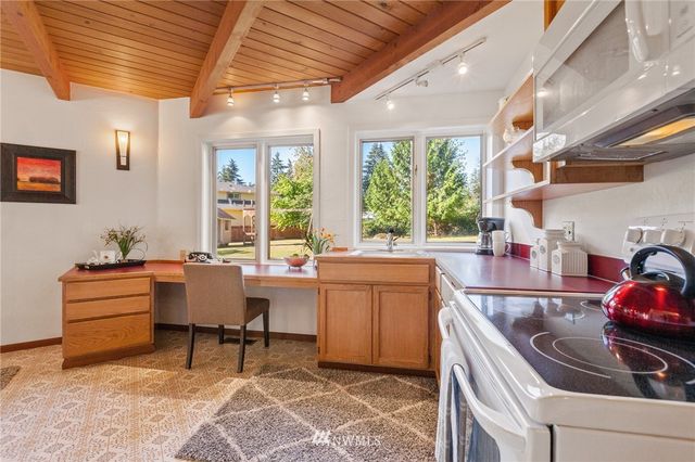 a room with furniture and window