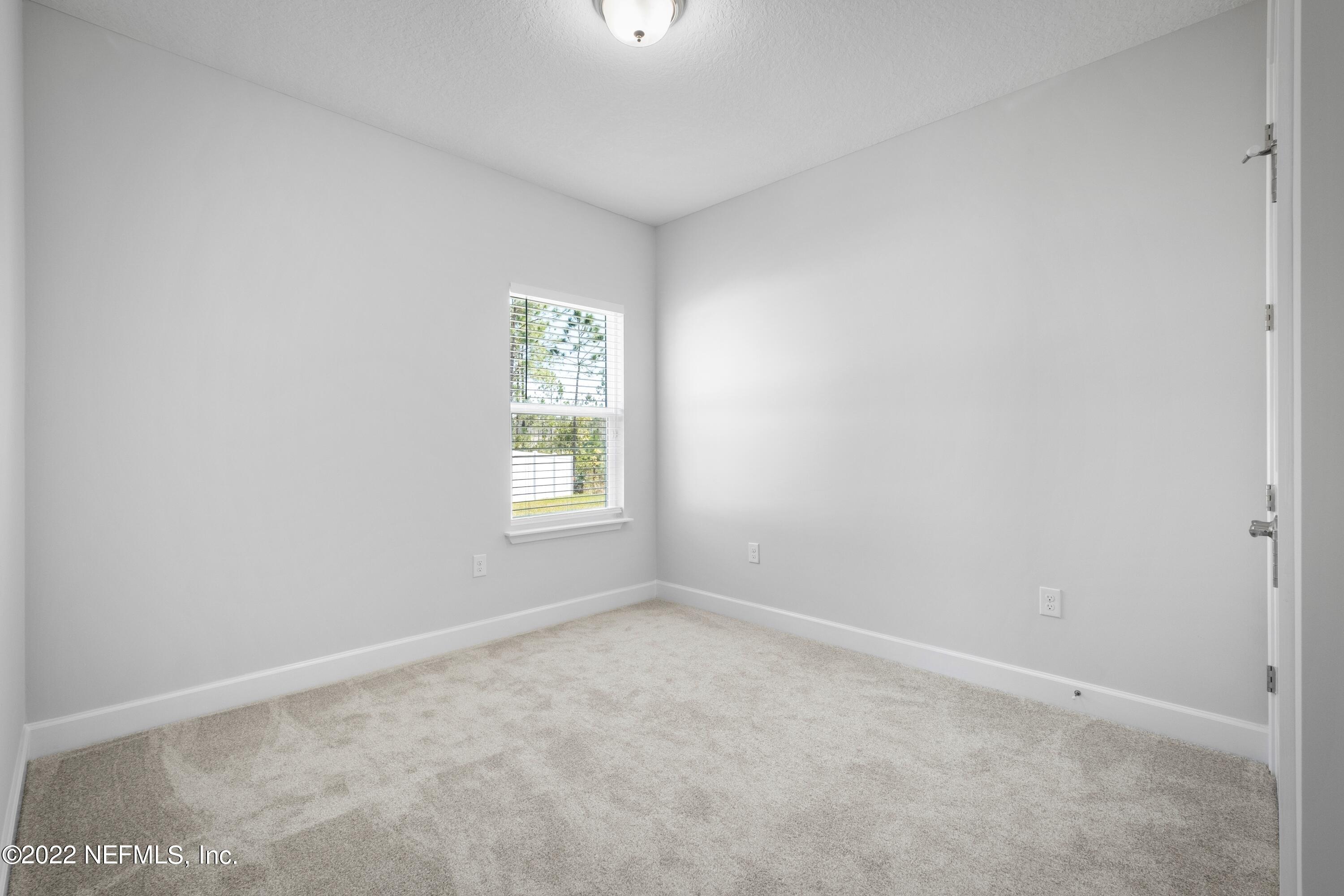 160 Daniel Creek Court St. Augustine, FL 32095 - Photo 11 of 35 an empty room with windows