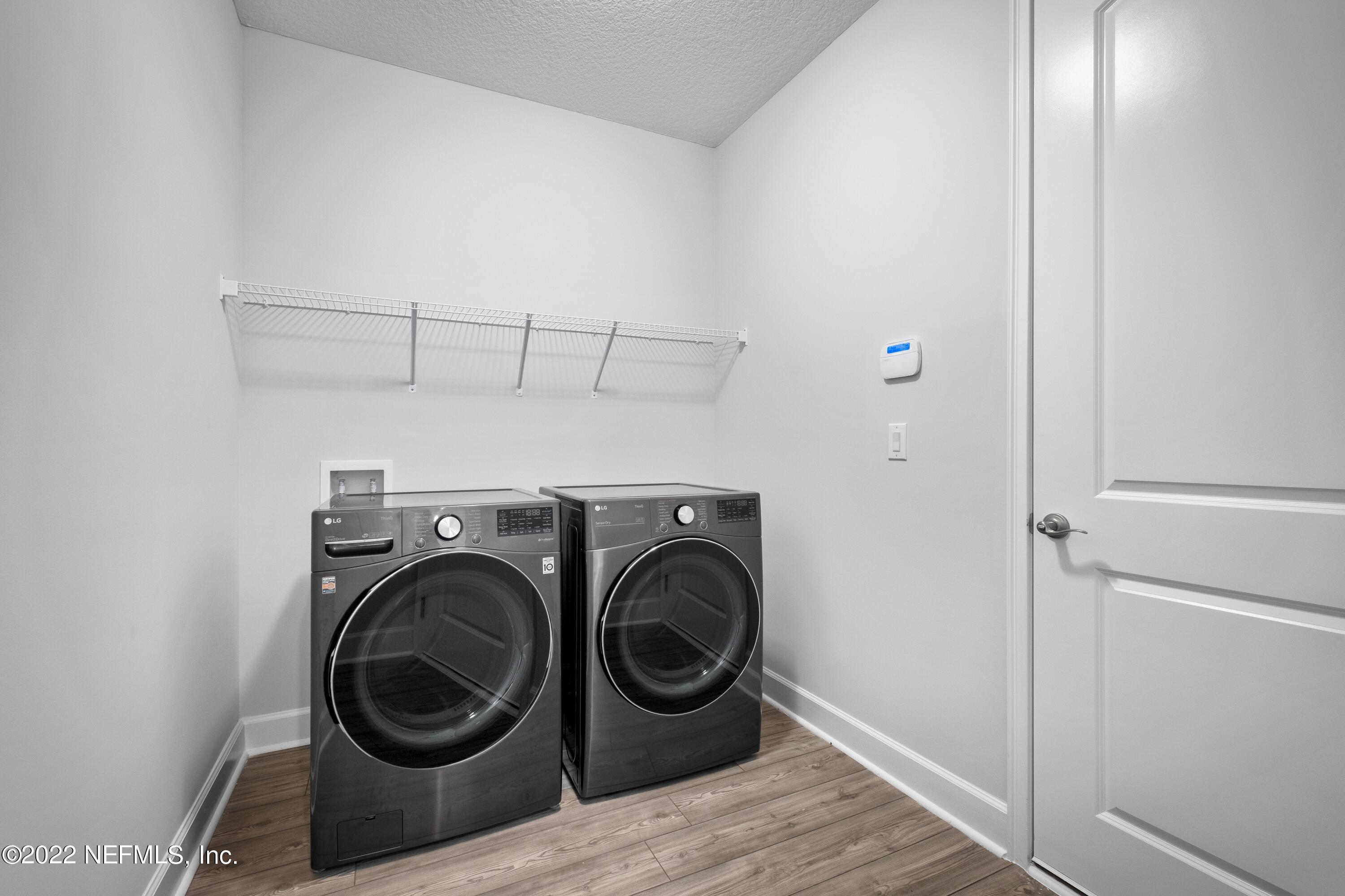 160 Daniel Creek Court St. Augustine, FL 32095 - Photo 22 of 35 a utility room with dryer and washer