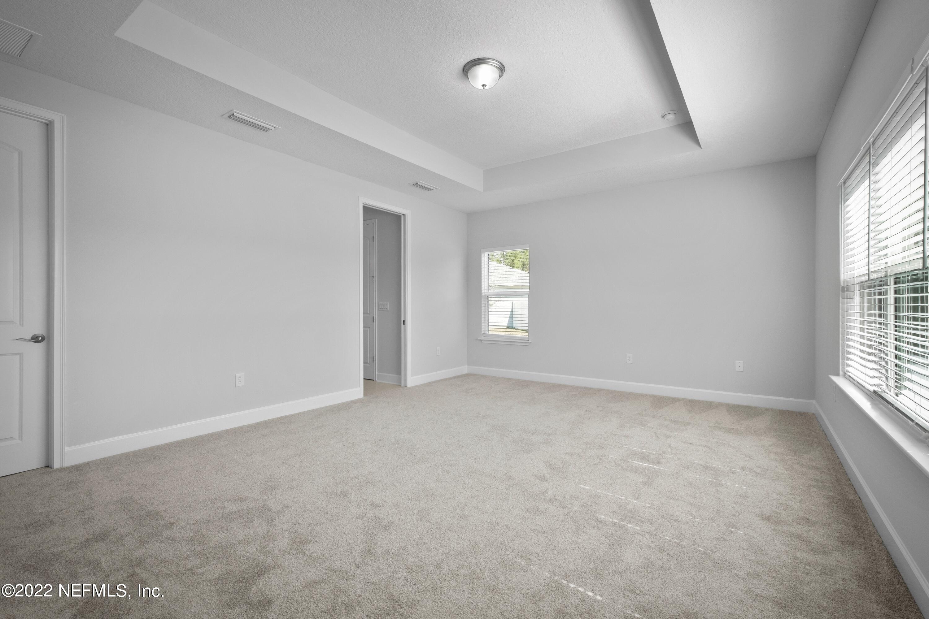 160 Daniel Creek Court St. Augustine, FL 32095 - Photo 26 of 35 an empty room with windows