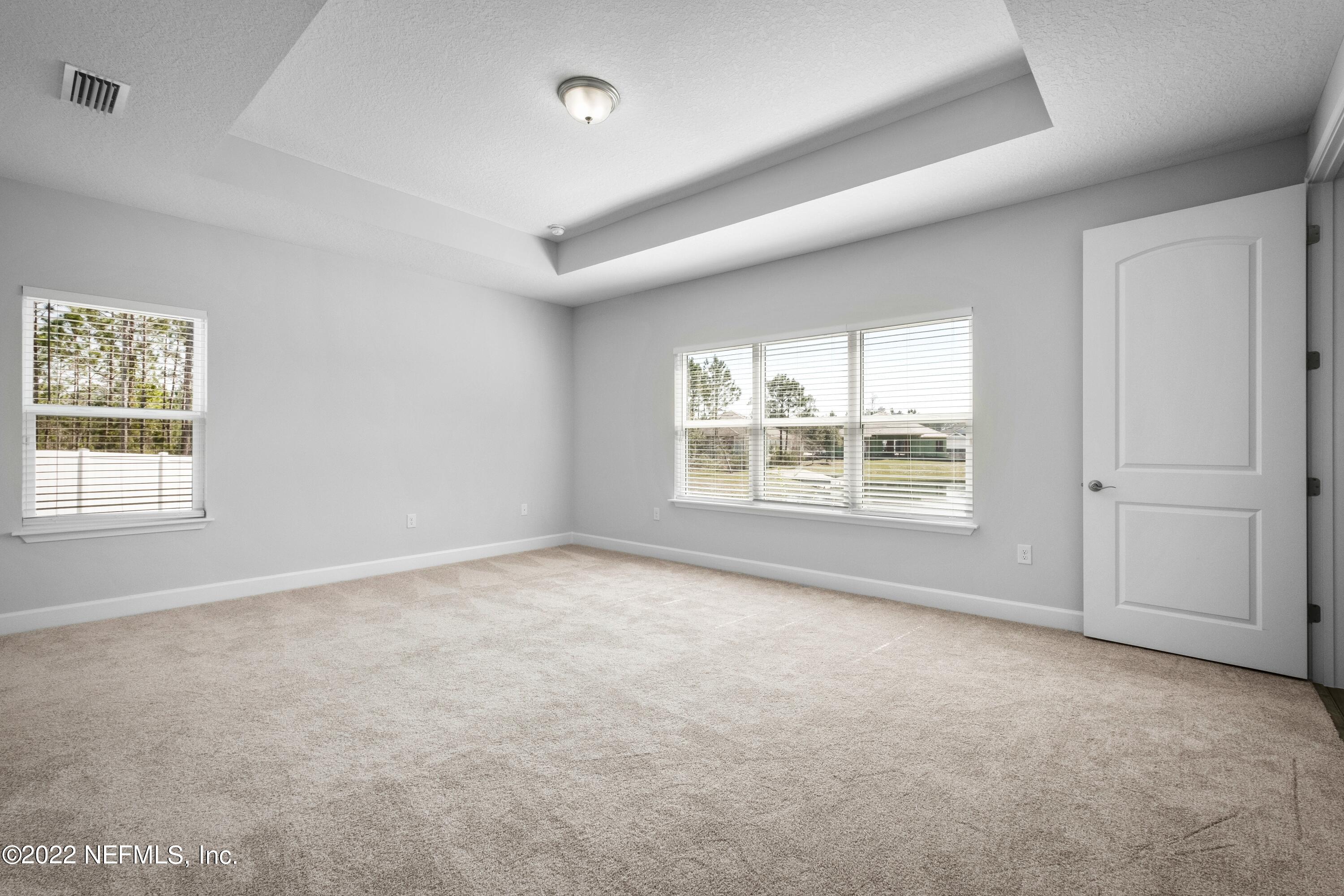 160 Daniel Creek Court St. Augustine, FL 32095 - Photo 27 of 35 an empty room with windows