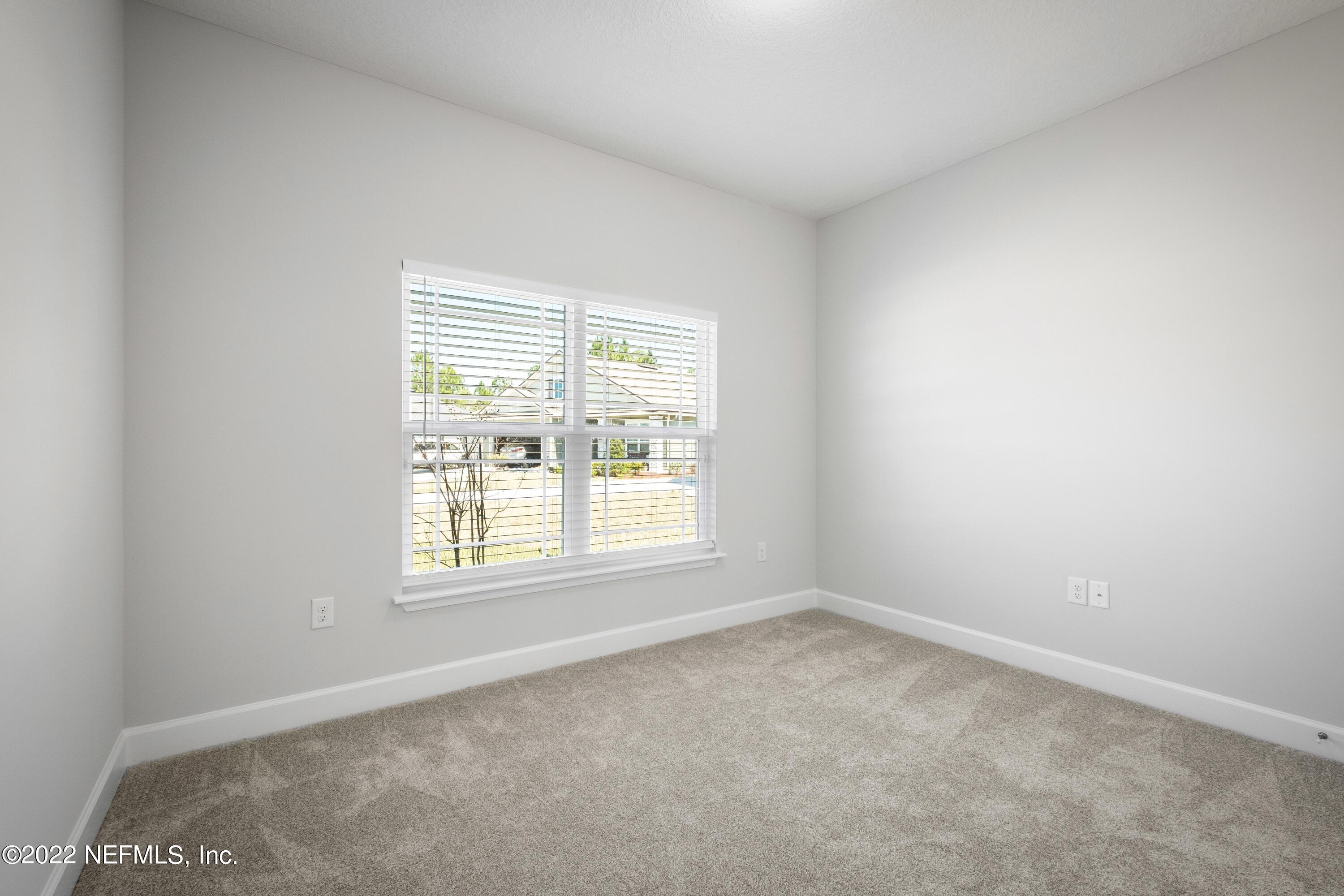 160 Daniel Creek Court St. Augustine, FL 32095 - Photo 8 of 35 an empty room with a window