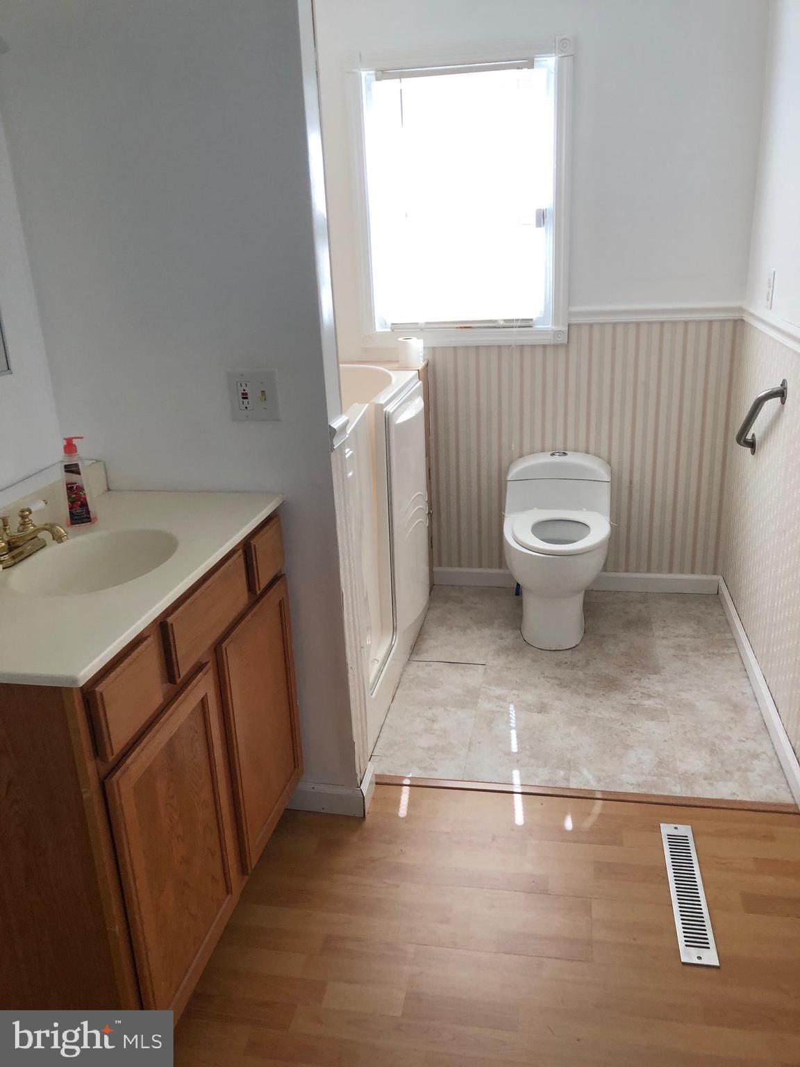 1304 Garrison Road Vineland, NJ 08360 - Photo 11 of 36 a view of bathroom with a sink and a toilet