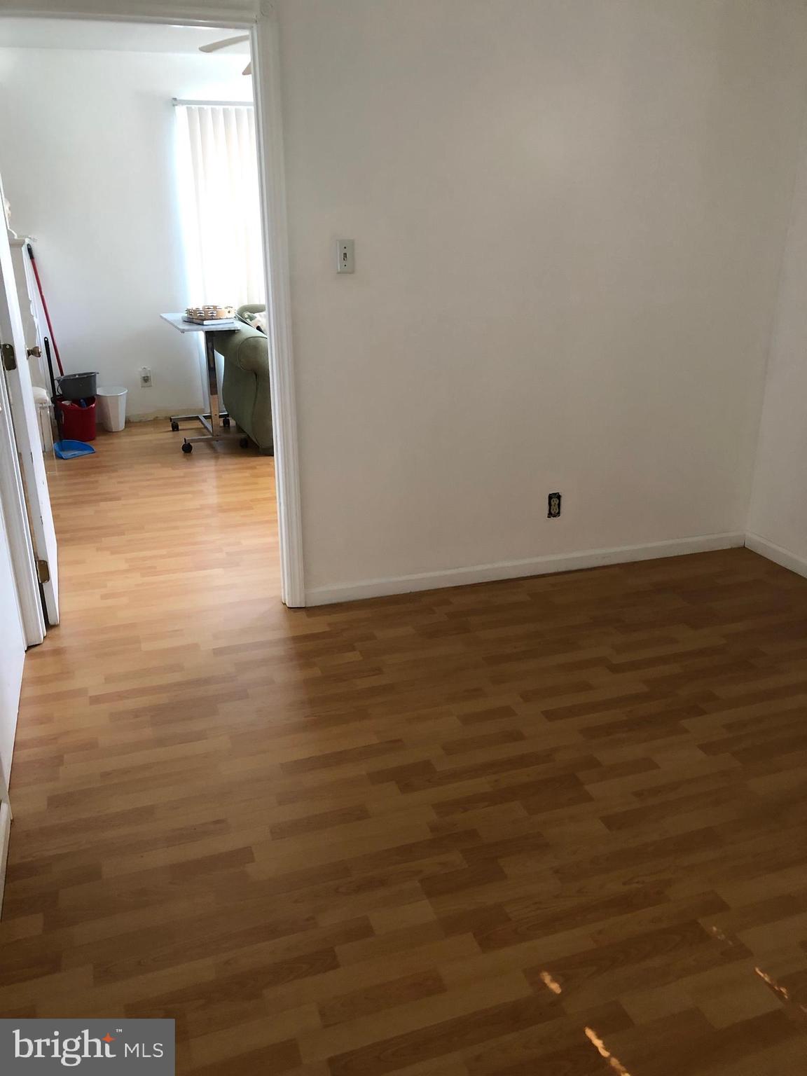 1304 Garrison Road Vineland, NJ 08360 - Photo 12 of 36 a view of a room with wooden floor and a sink