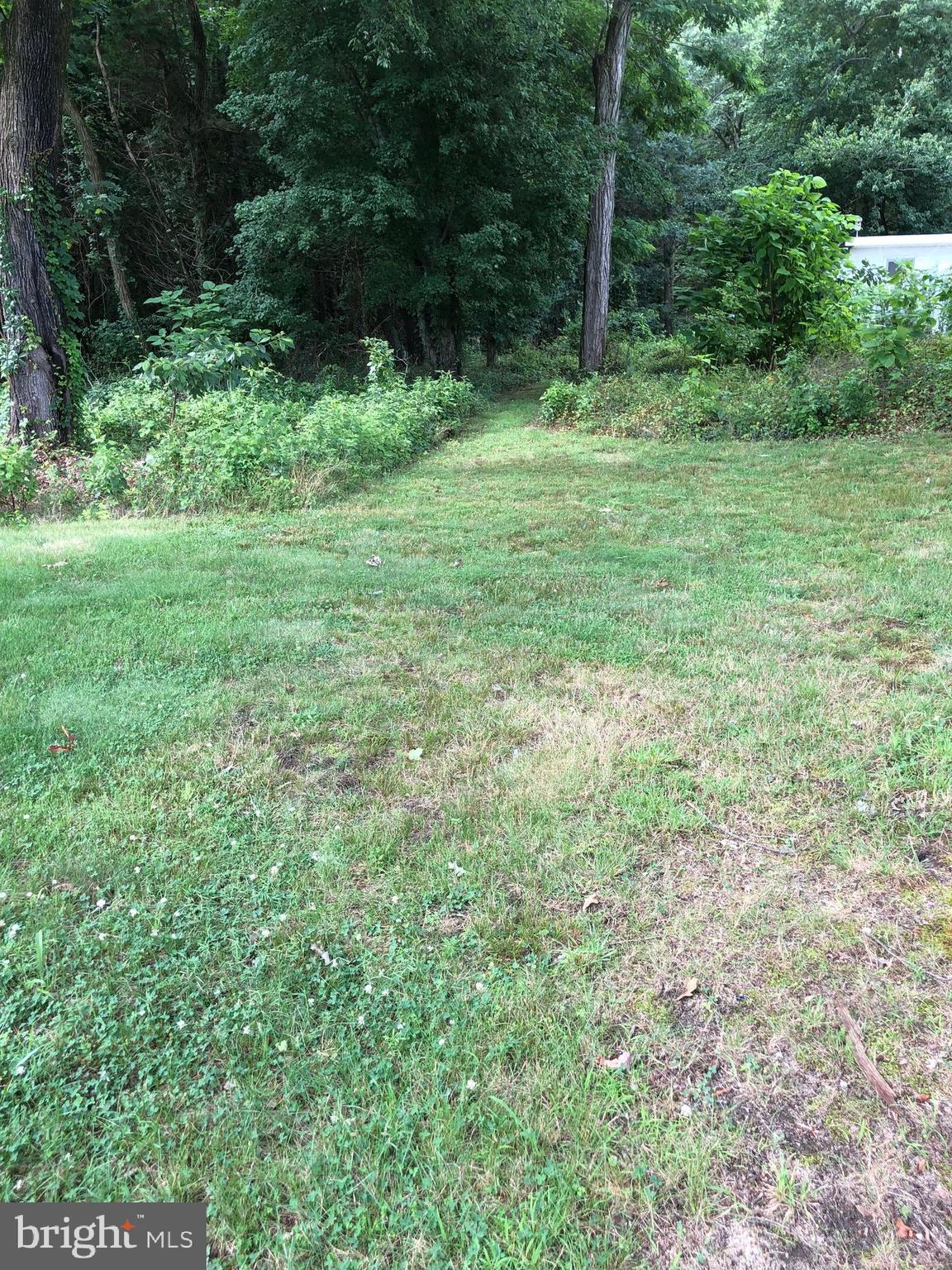 1304 Garrison Road Vineland, NJ 08360 - Photo 25 of 36 a view of outdoor space with deck and yard