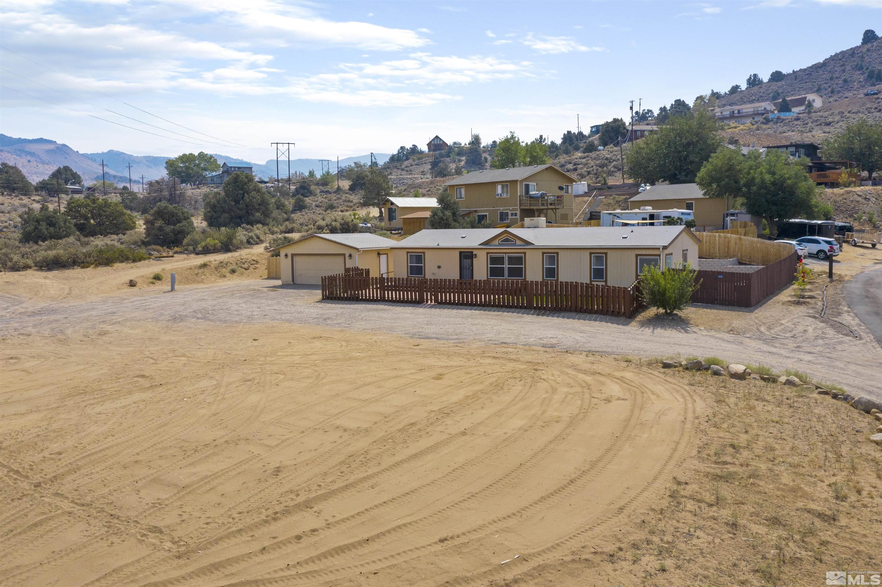 16000 Perlite Drive Reno, NV 89521 - Photo 1 of 29 a view of a lake with houses