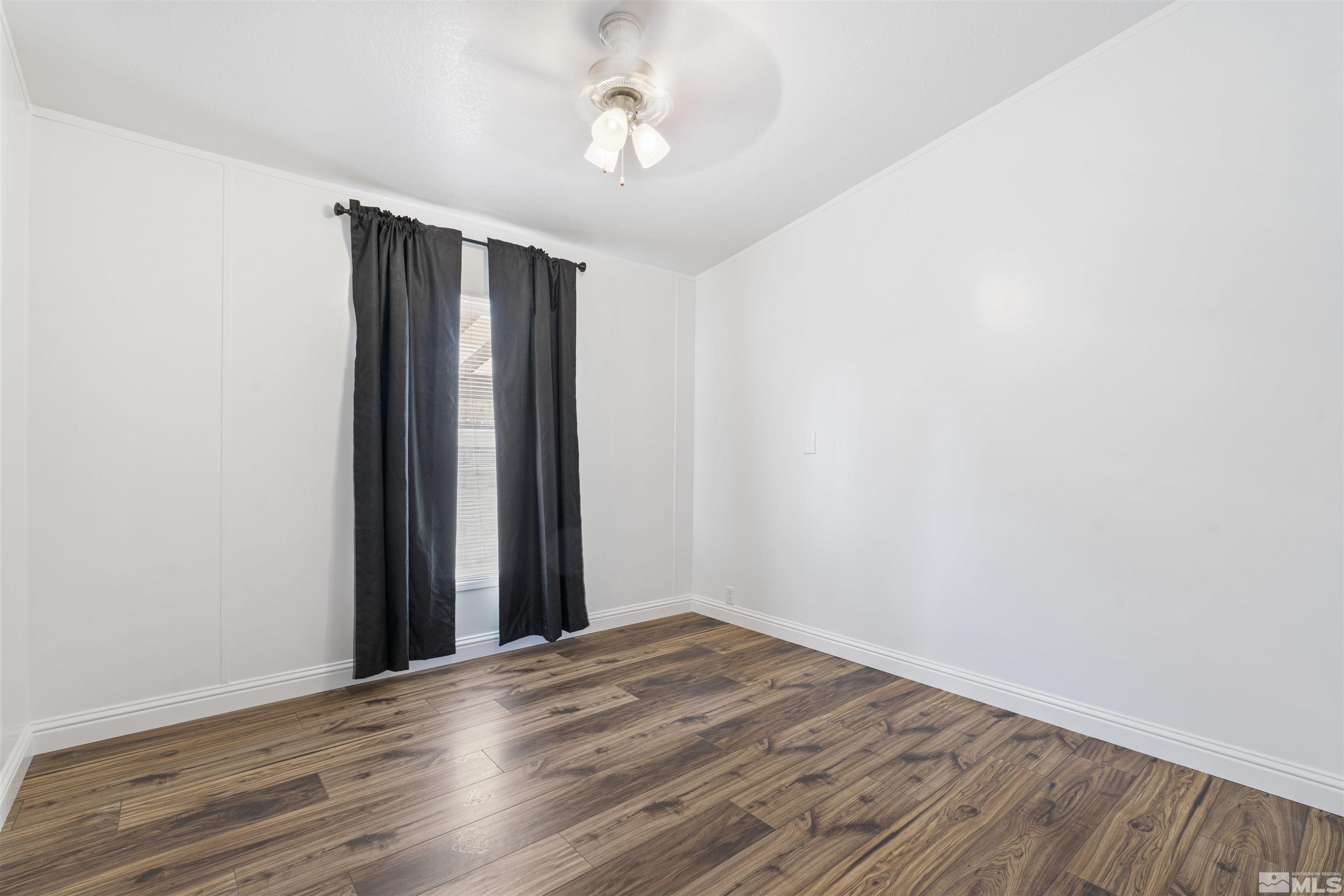 16000 Perlite Drive Reno, NV 89521 - Photo 17 of 29 wooden floor in an empty room