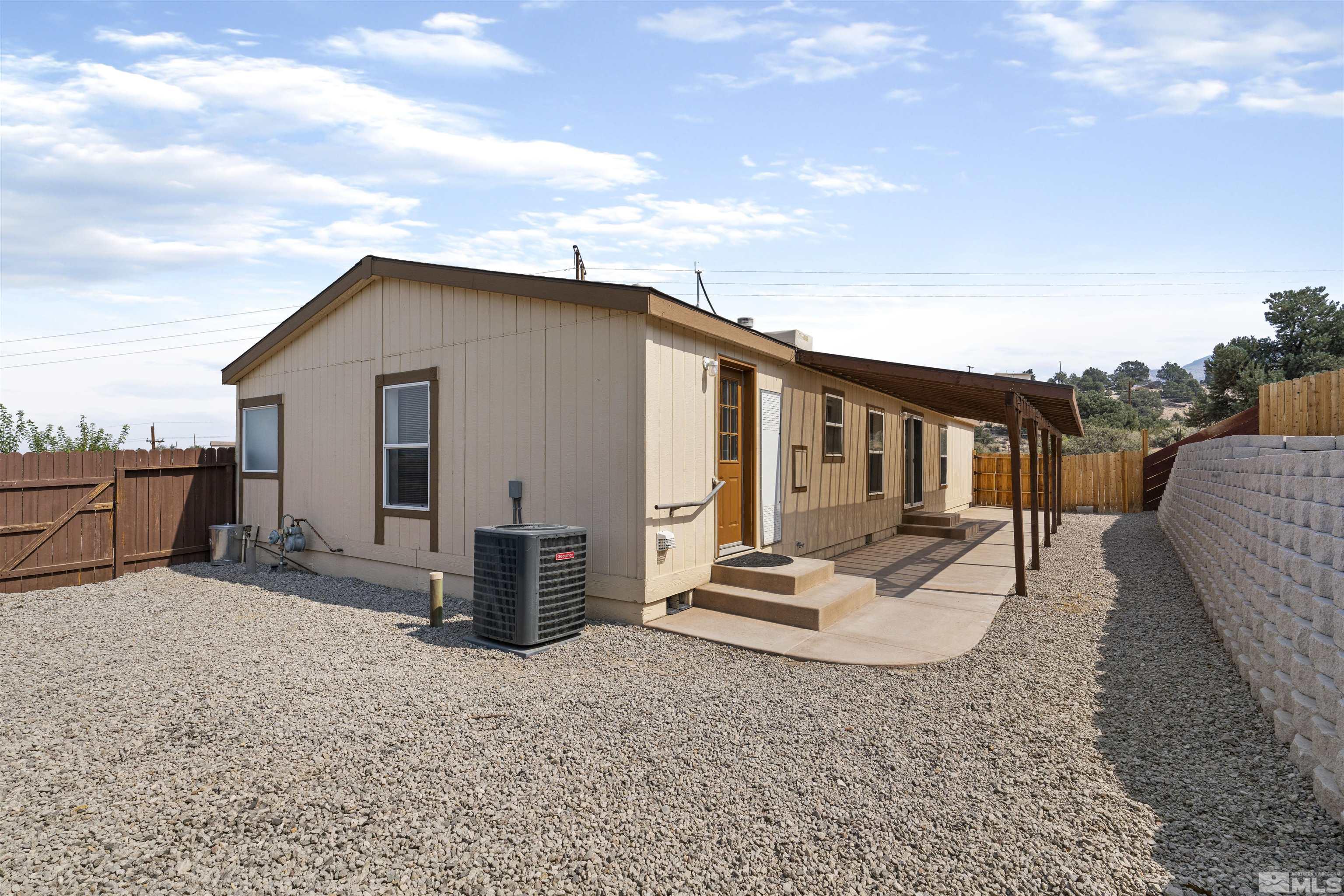 16000 Perlite Drive Reno, NV 89521 - Photo 20 of 29 a view of a house with backyard and sitting area