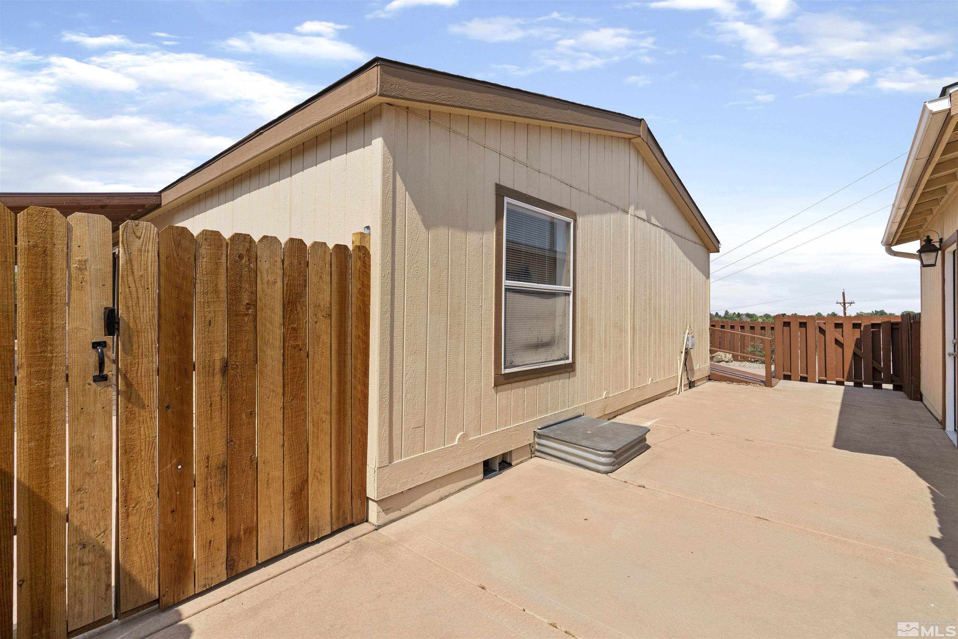 16000 Perlite Drive Reno, NV 89521 - Photo 21 of 29 a view of a house with a backyard