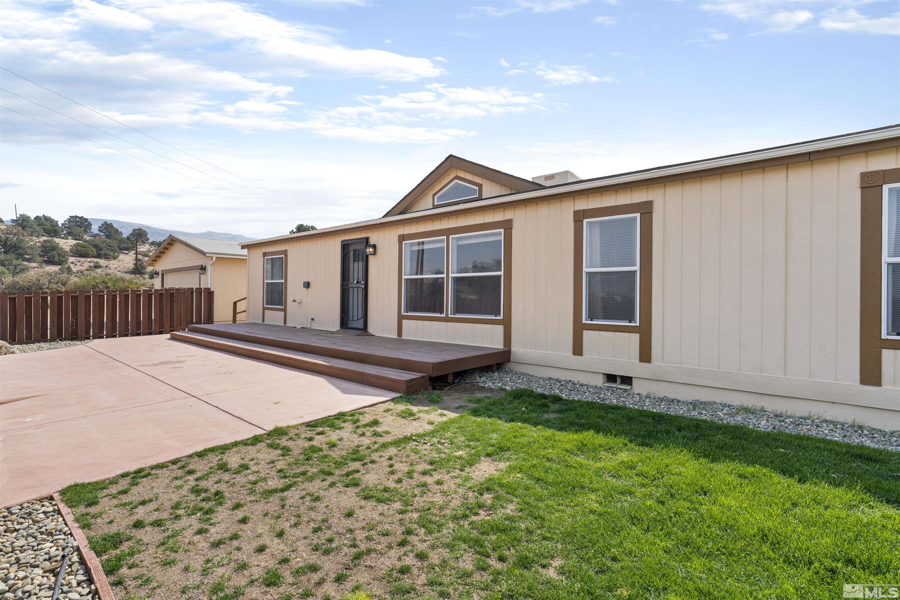 16000 Perlite Drive Reno, NV 89521 - Photo 22 of 29 a house view with a garden space
