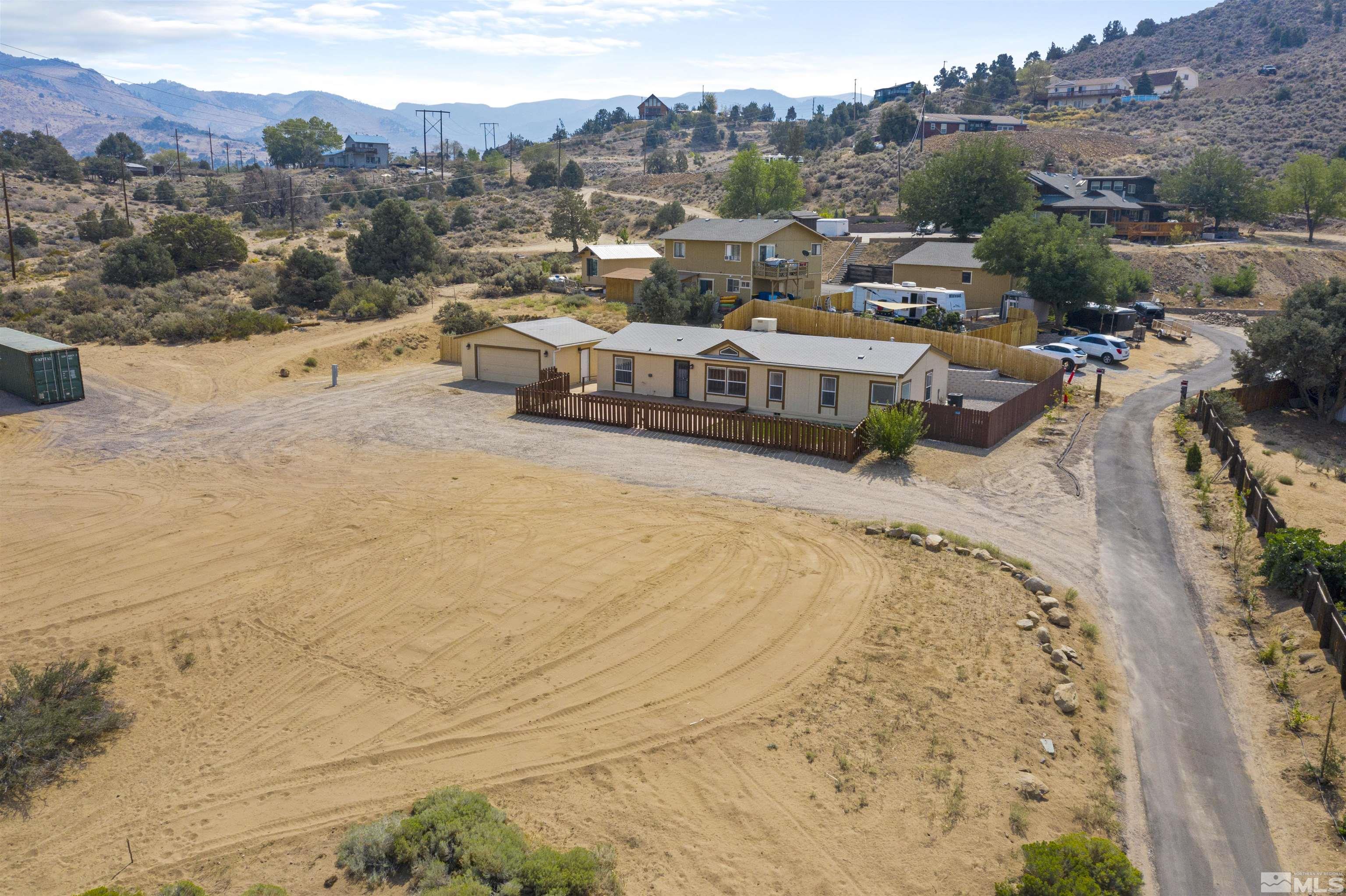 16000 Perlite Drive Reno, NV 89521 - Photo 23 of 29 an aerial view of a house with a mountain
