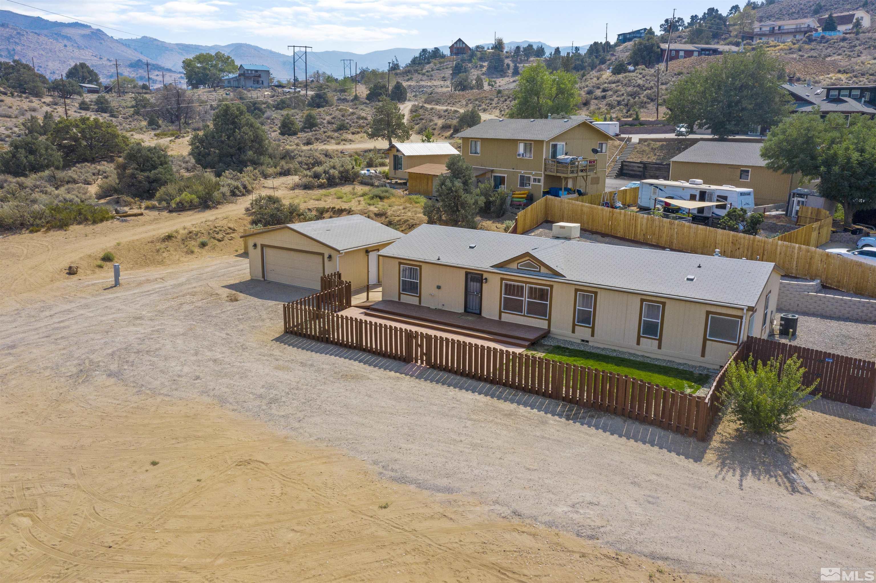 16000 Perlite Drive Reno, NV 89521 - Photo 24 of 29 an aerial view of a house with a garden and large trees