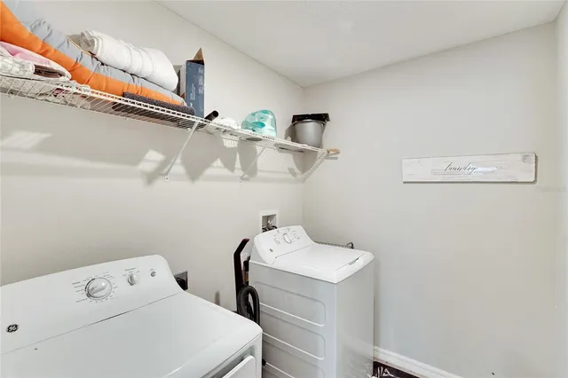 a view of room with window and hardwood floor