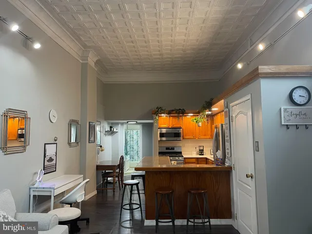 a view of room with furniture and window