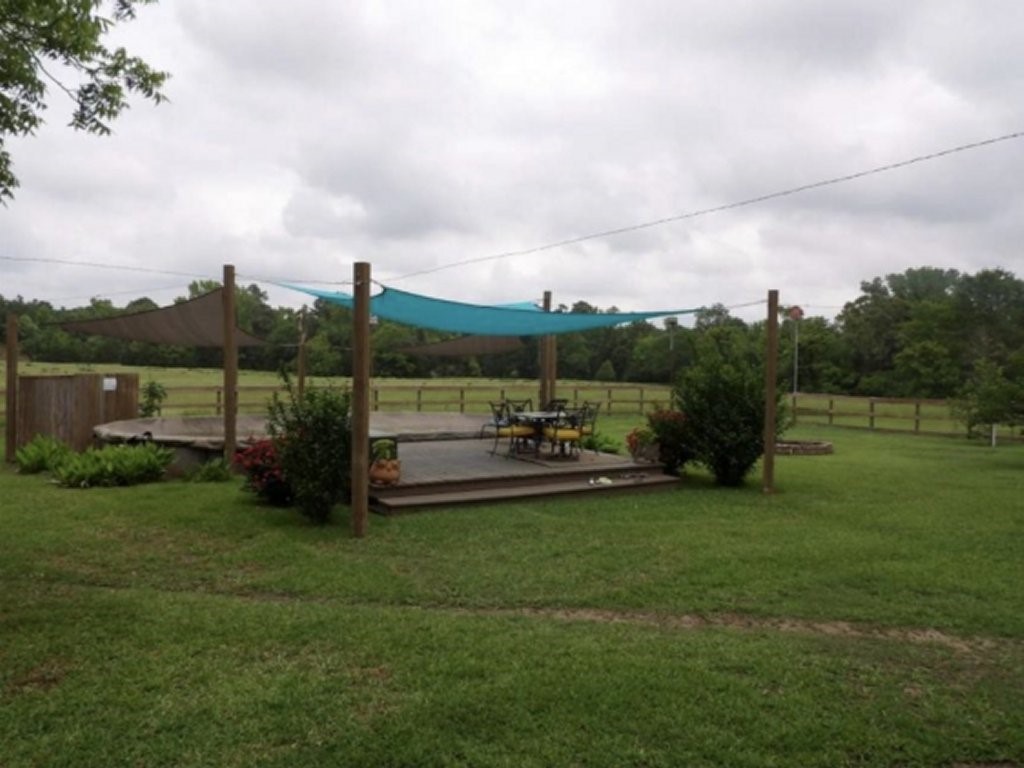 198 Fm 2974 Rd Center Center, TX 75935 - Photo 18 of 50 a view of a garden and lake