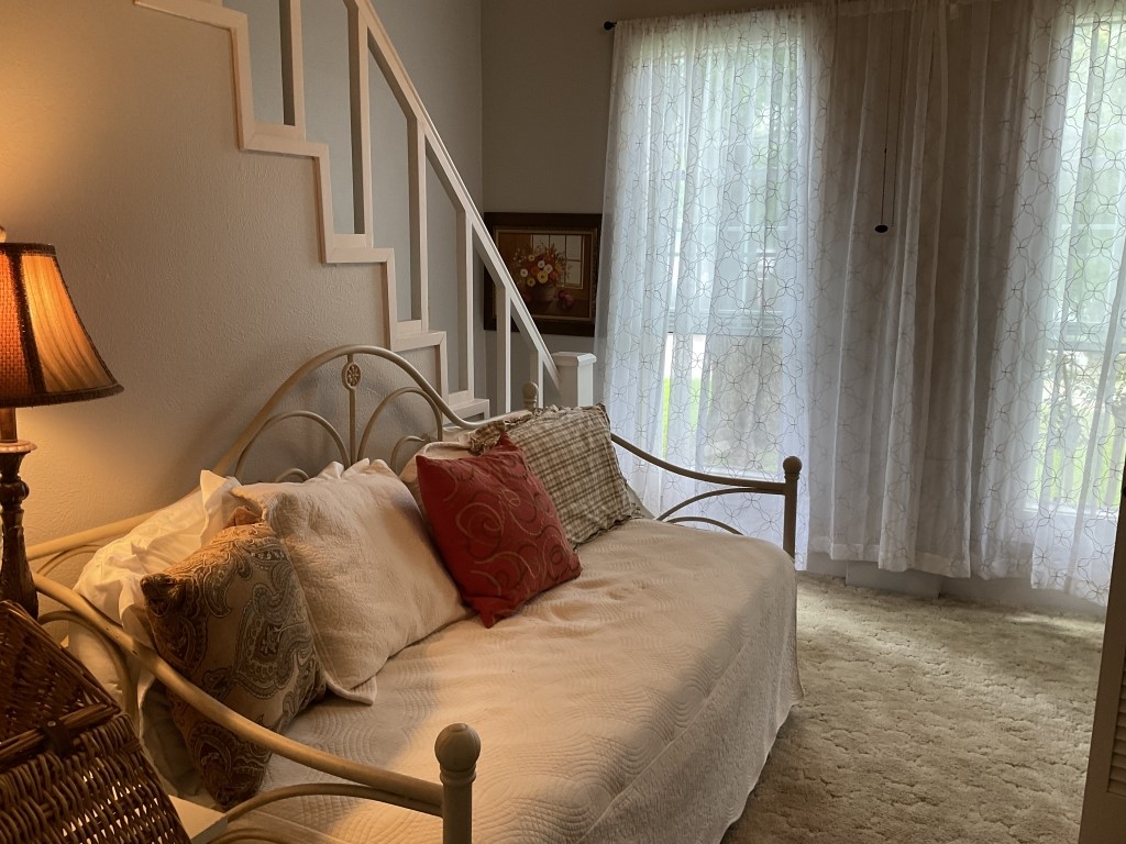 198 Fm 2974 Rd Center Center, TX 75935 - Photo 34 of 50 a bed sitting in a bedroom next to a window