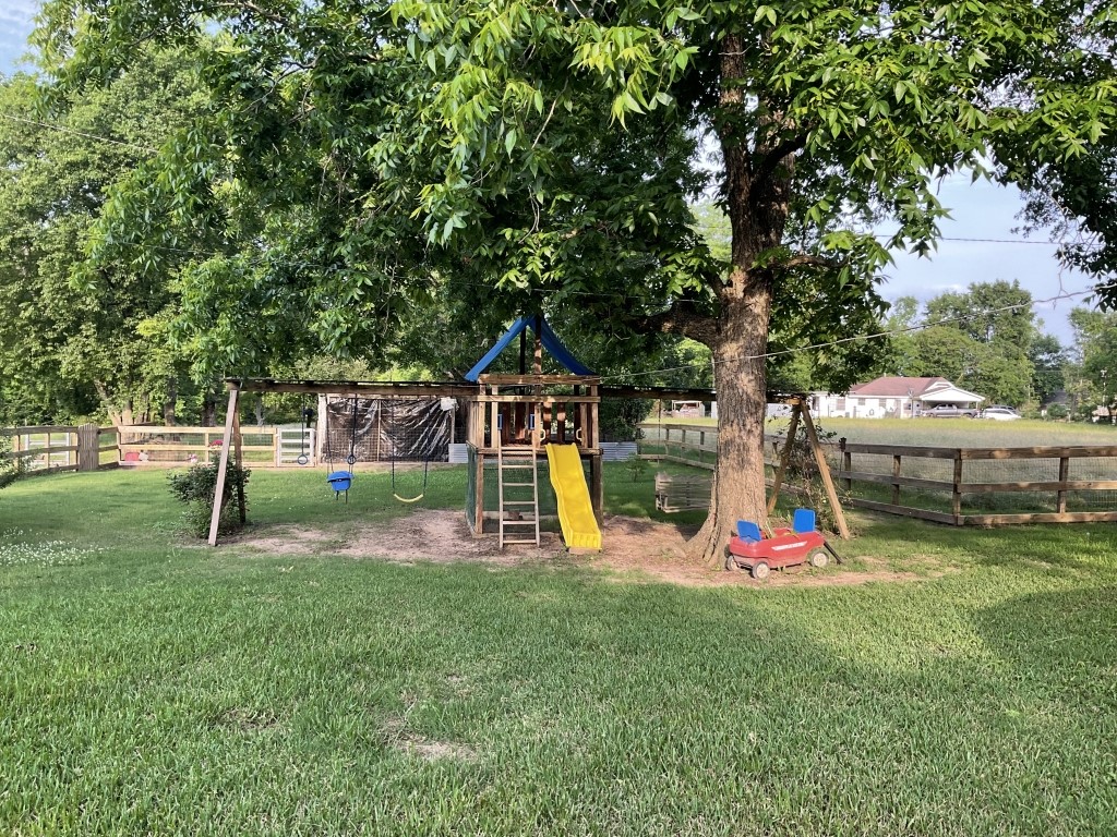 198 Fm 2974 Rd Center Center, TX 75935 - Photo 46 of 50 a childrens park with lots of swings and slides