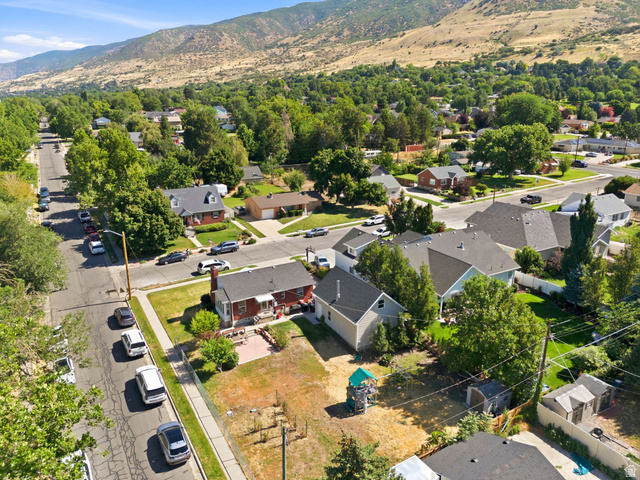 310 East 600 South Centerville, UT 84014 - Photo 38 of 41 Residential neighborhood featuring mature trees and mountain topography