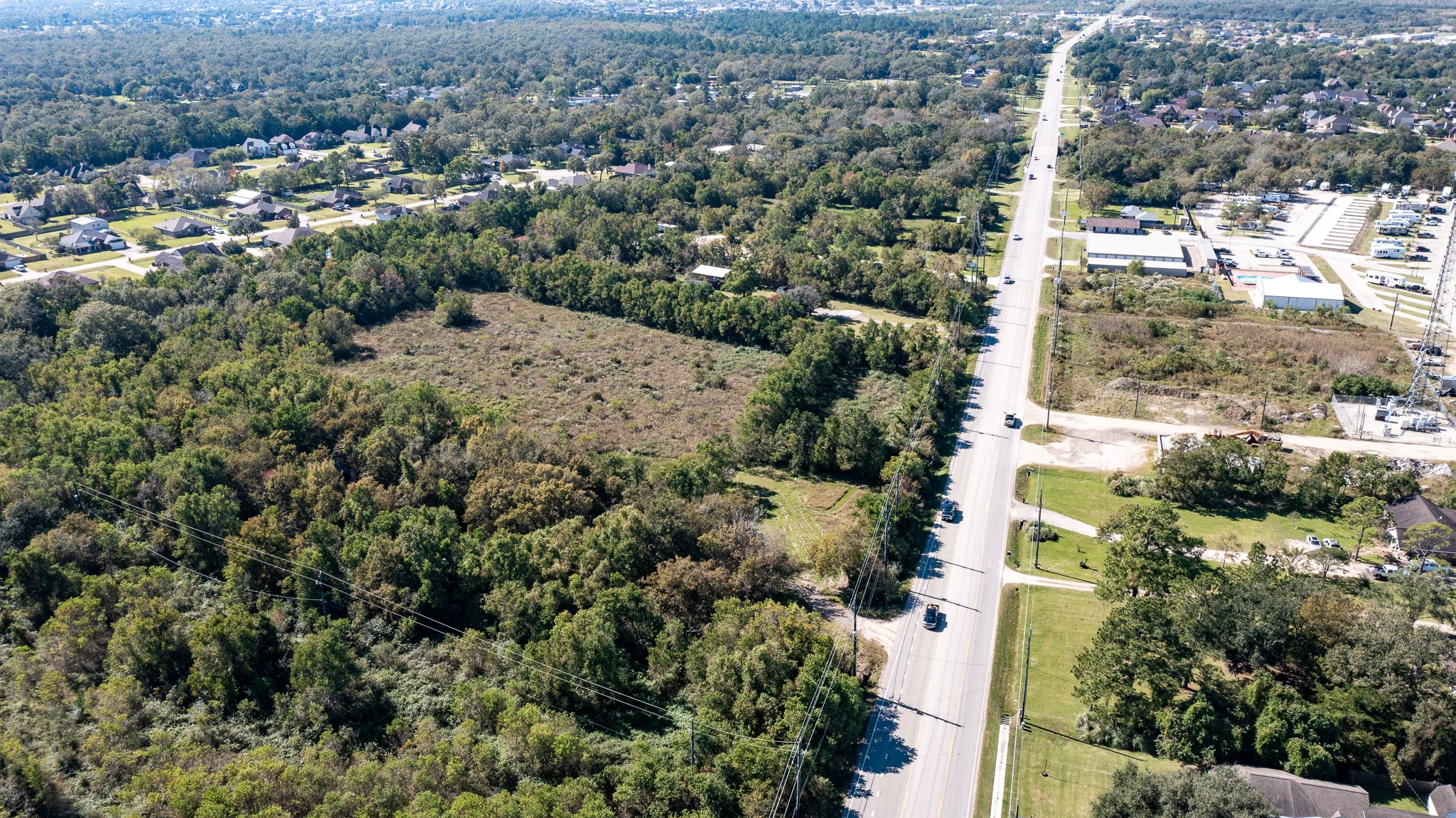 5610 South Farm-to-Market 565 Road Baytown, TX 77523 - Photo 4 of 20 an aerial view of residential houses with outdoor space