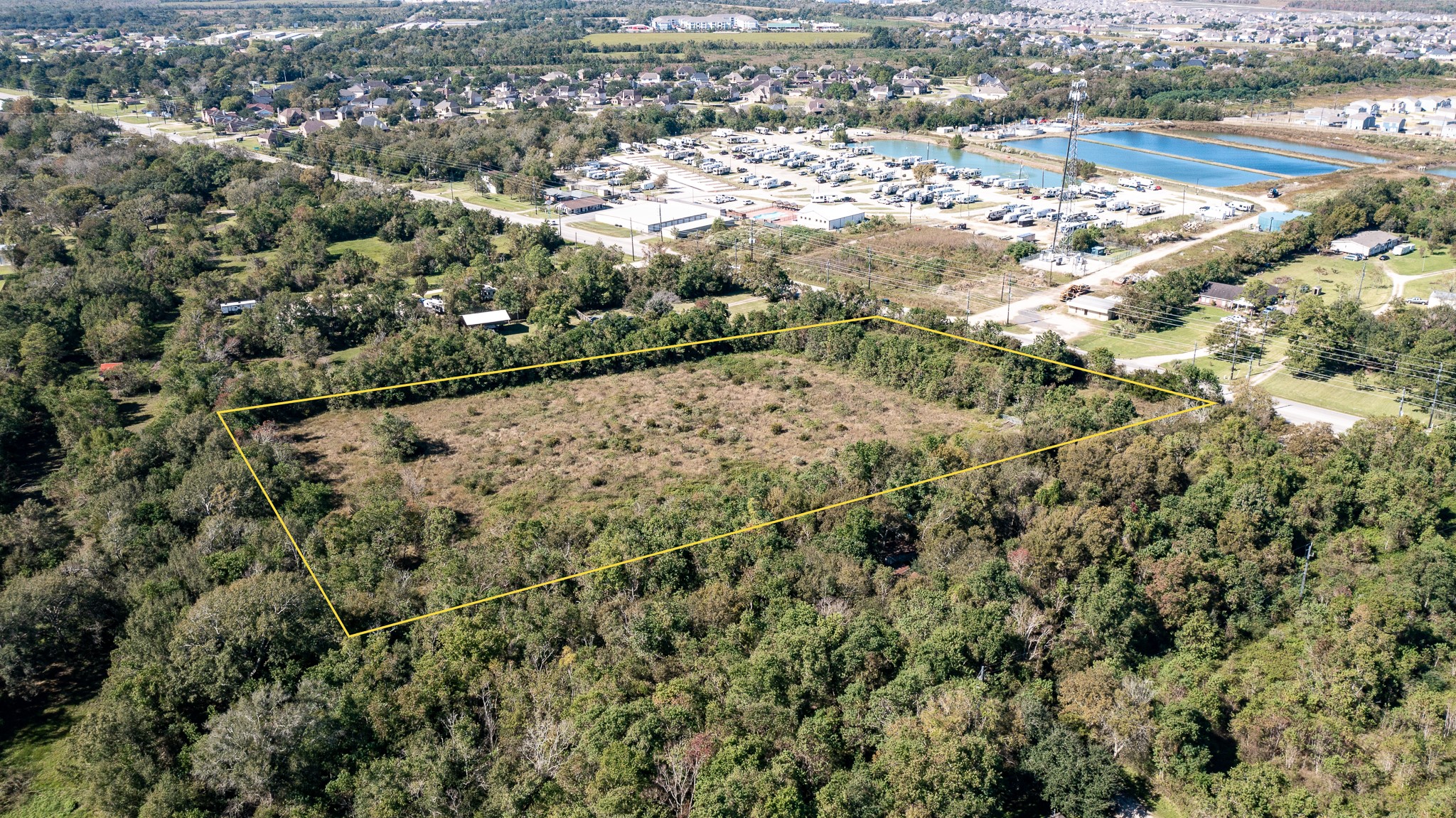 5610 South Farm-to-Market 565 Road Baytown, TX 77523 - Photo 5 of 20 an aerial view of a house with a yard