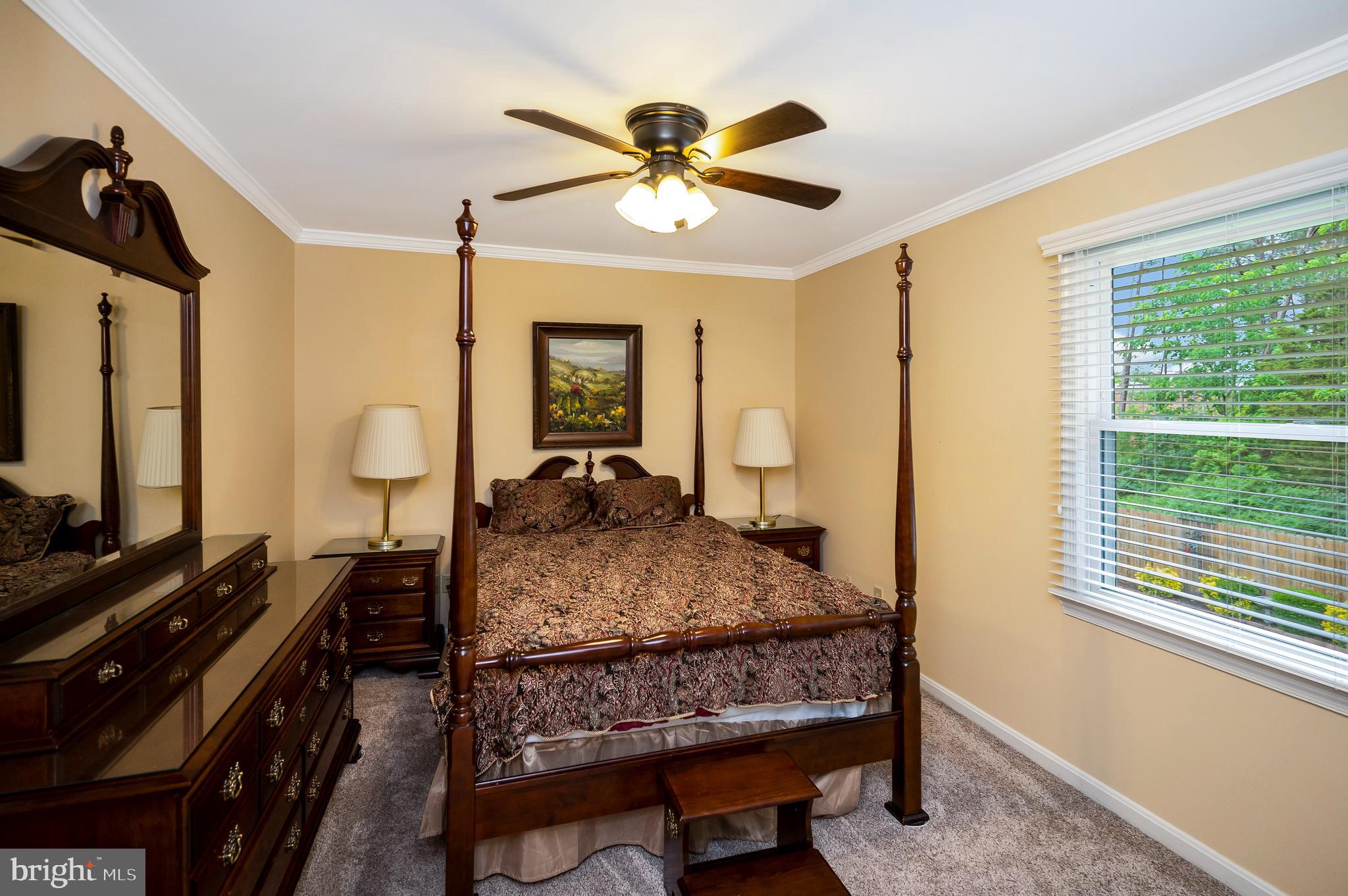 14 Apache Terrace Fredericksburg, VA 22401 - Photo 13 of 38 a bed room with a bed and a chandelier
