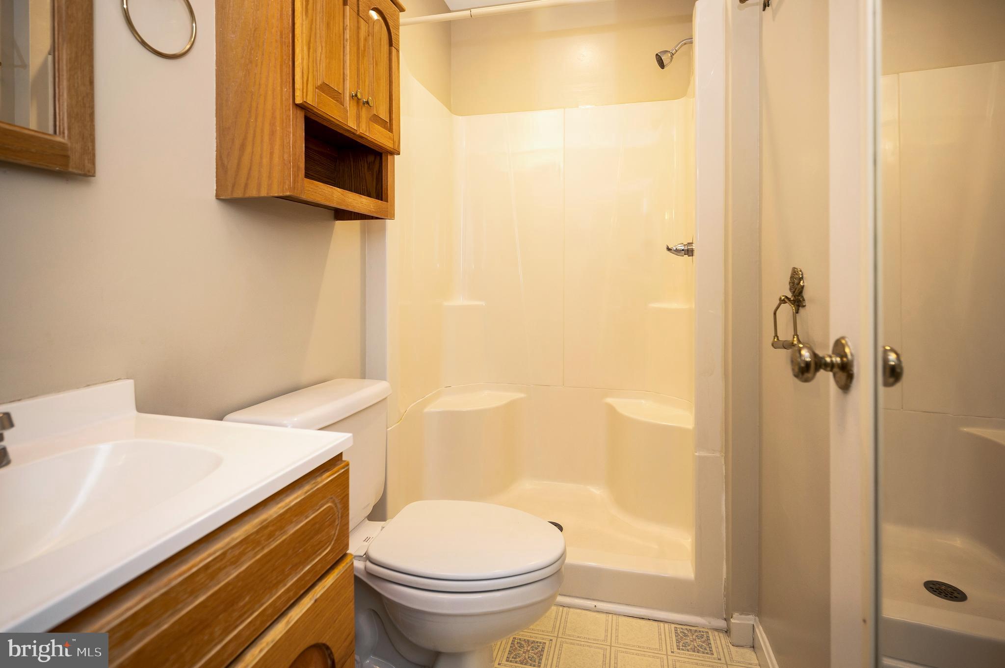 14 Apache Terrace Fredericksburg, VA 22401 - Photo 15 of 38 a bathroom with a sink toilet and shower