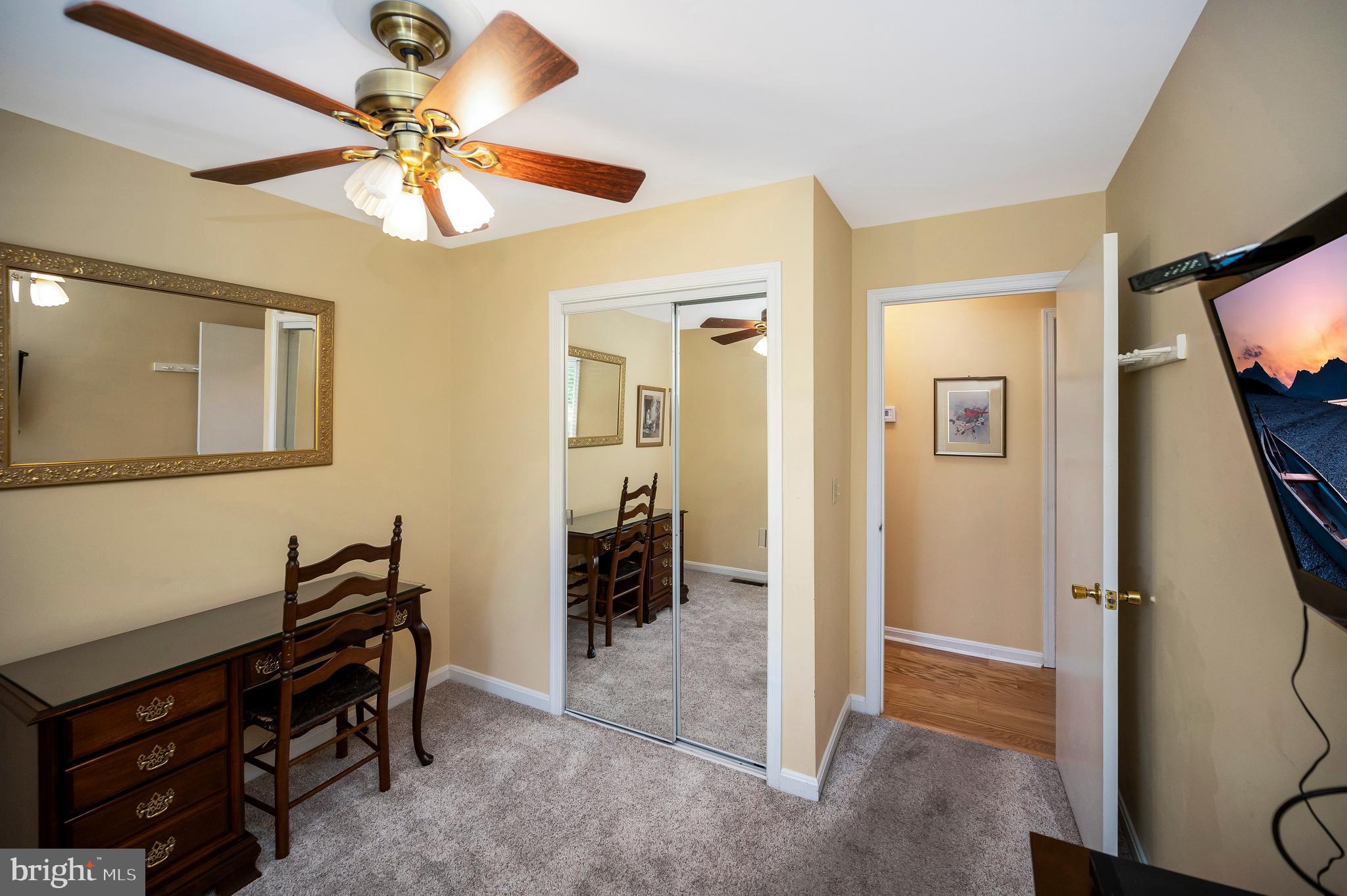 14 Apache Terrace Fredericksburg, VA 22401 - Photo 18 of 38 workspace with wooden floor fan and windows