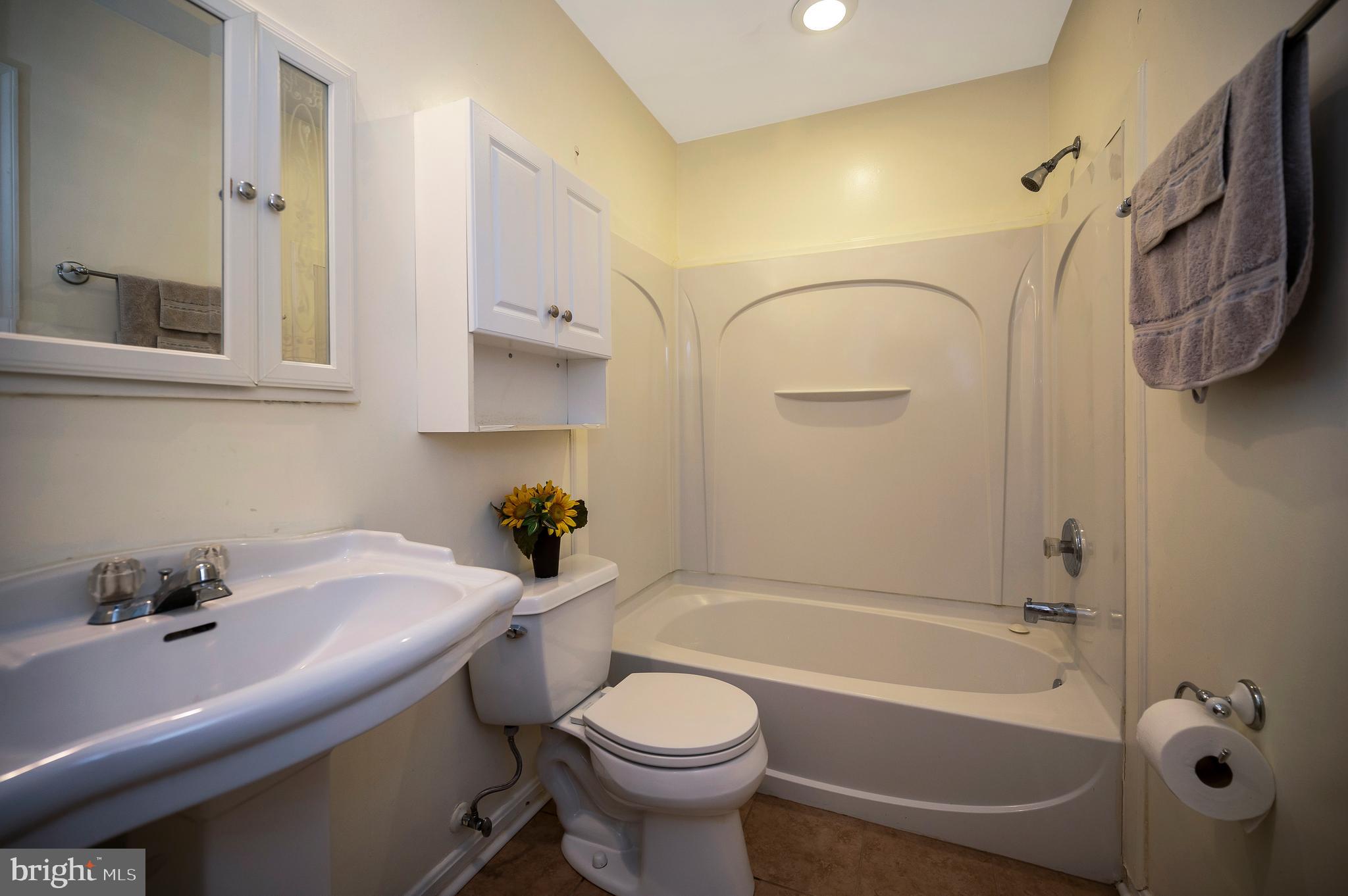 14 Apache Terrace Fredericksburg, VA 22401 - Photo 21 of 38 a bathroom with a sink a toilet and bathtub
