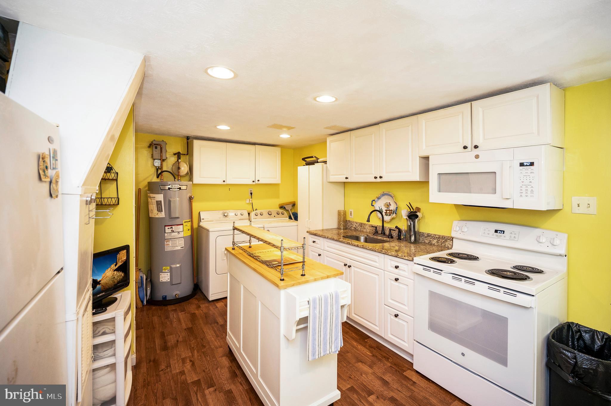 14 Apache Terrace Fredericksburg, VA 22401 - Photo 27 of 38 a kitchen with stainless steel appliances a stove a sink and a refrigerator