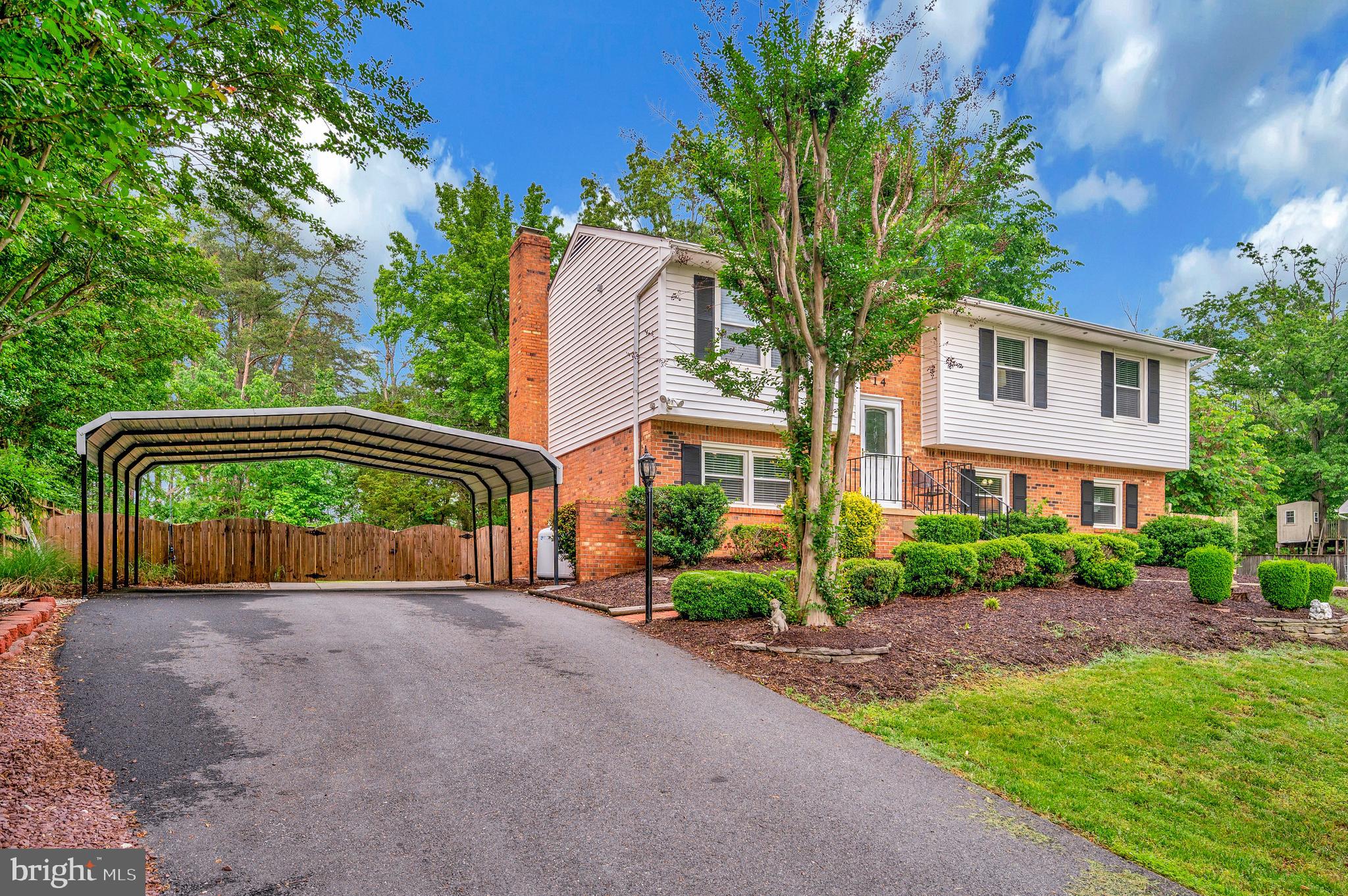 14 Apache Terrace Fredericksburg, VA 22401 - Photo 38 of 38 a front view of a house with a garden