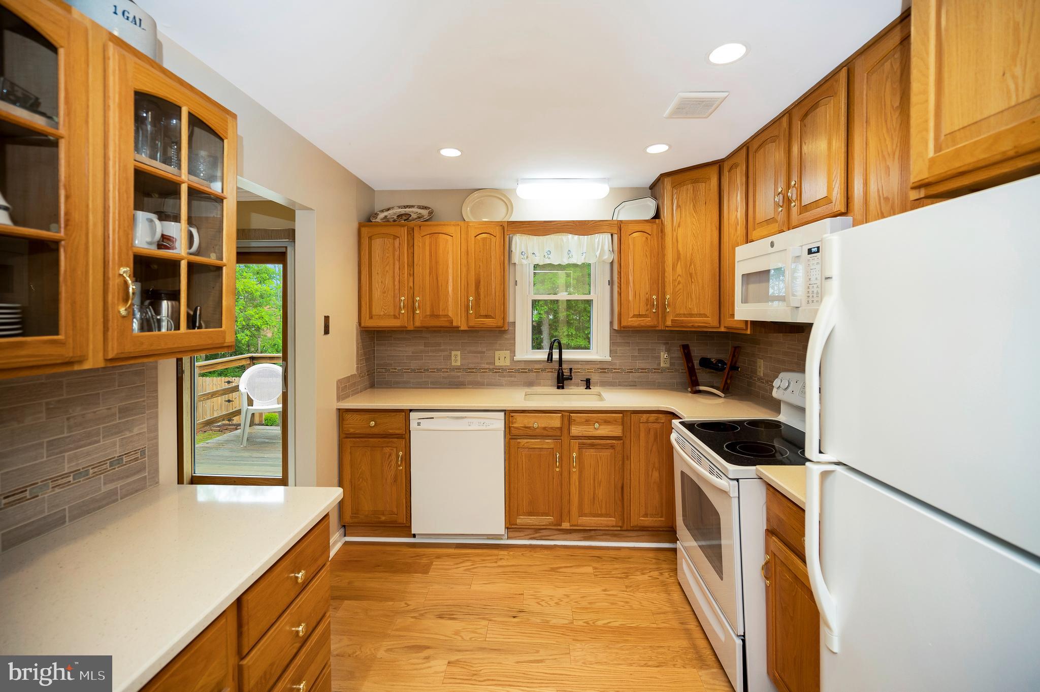 14 Apache Terrace Fredericksburg, VA 22401 - Photo 8 of 38 a kitchen with stainless steel appliances granite countertop a stove a sink and a refrigerator