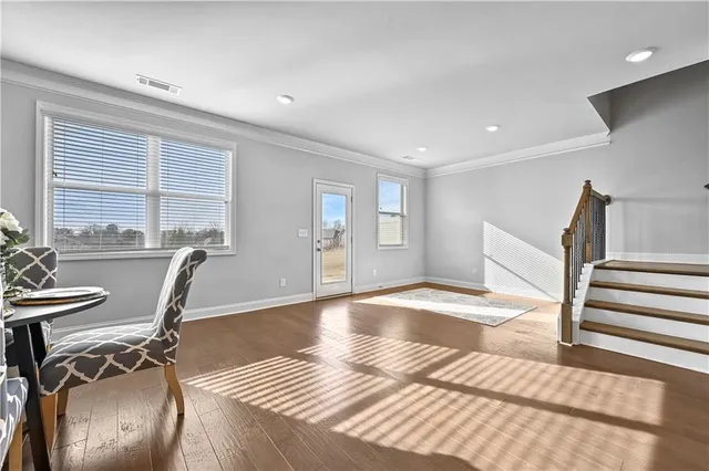 a view of a livingroom with furniture and window