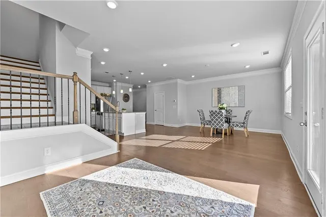 a view of a living room and dining room