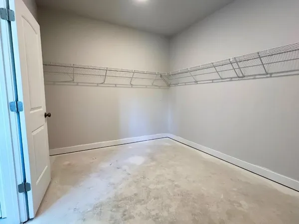 a view of a room with racks on the wall