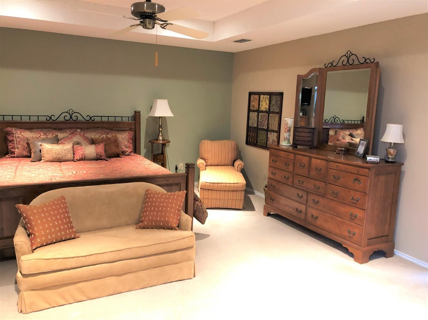 4018 88th Place Lubbock, TX 79423 - Photo 14 of 31 a bedroom with a bed window and dresser