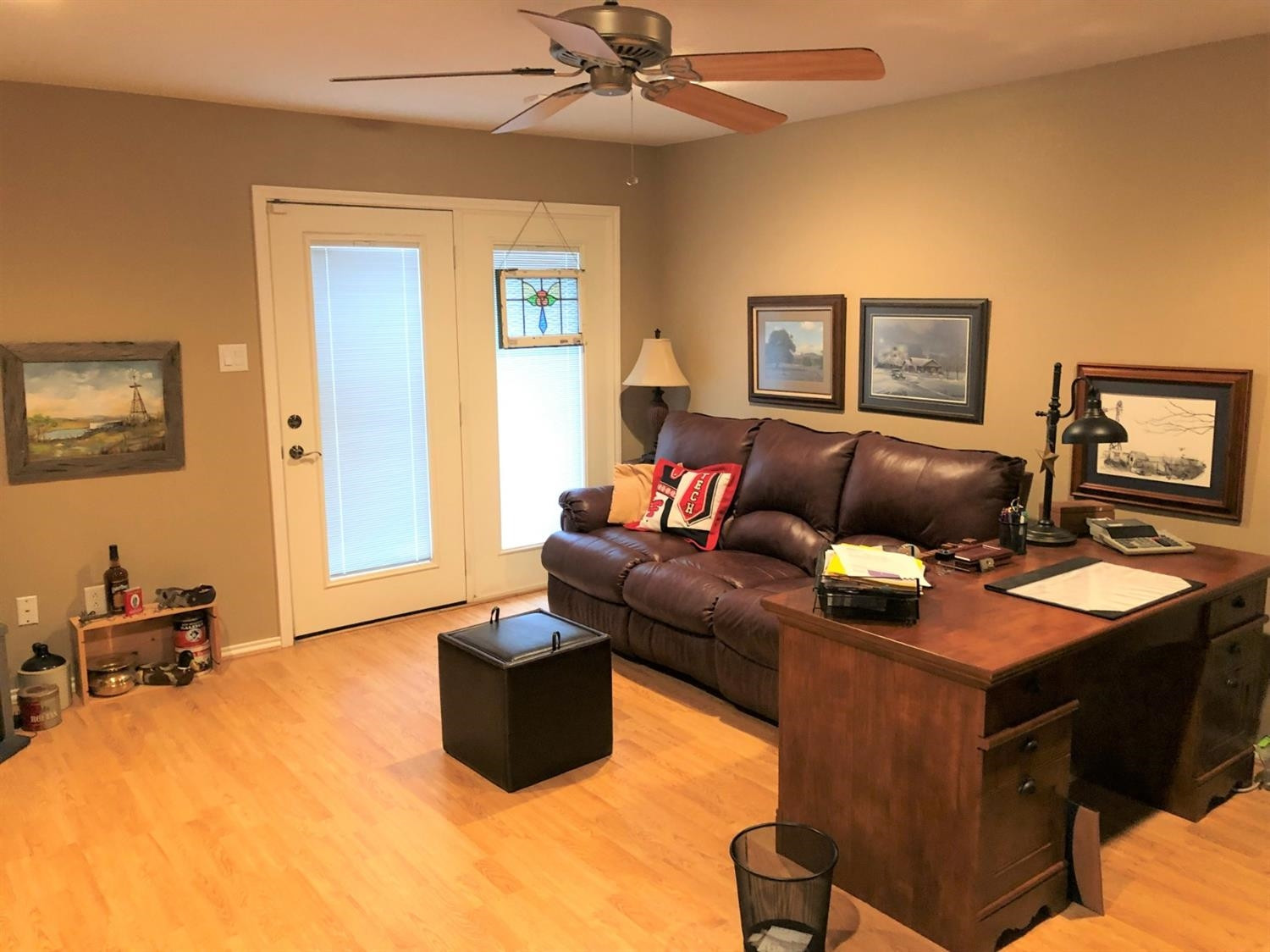 4018 88th Place Lubbock, TX 79423 - Photo 31 of 31 a living room with furniture and a flat screen tv