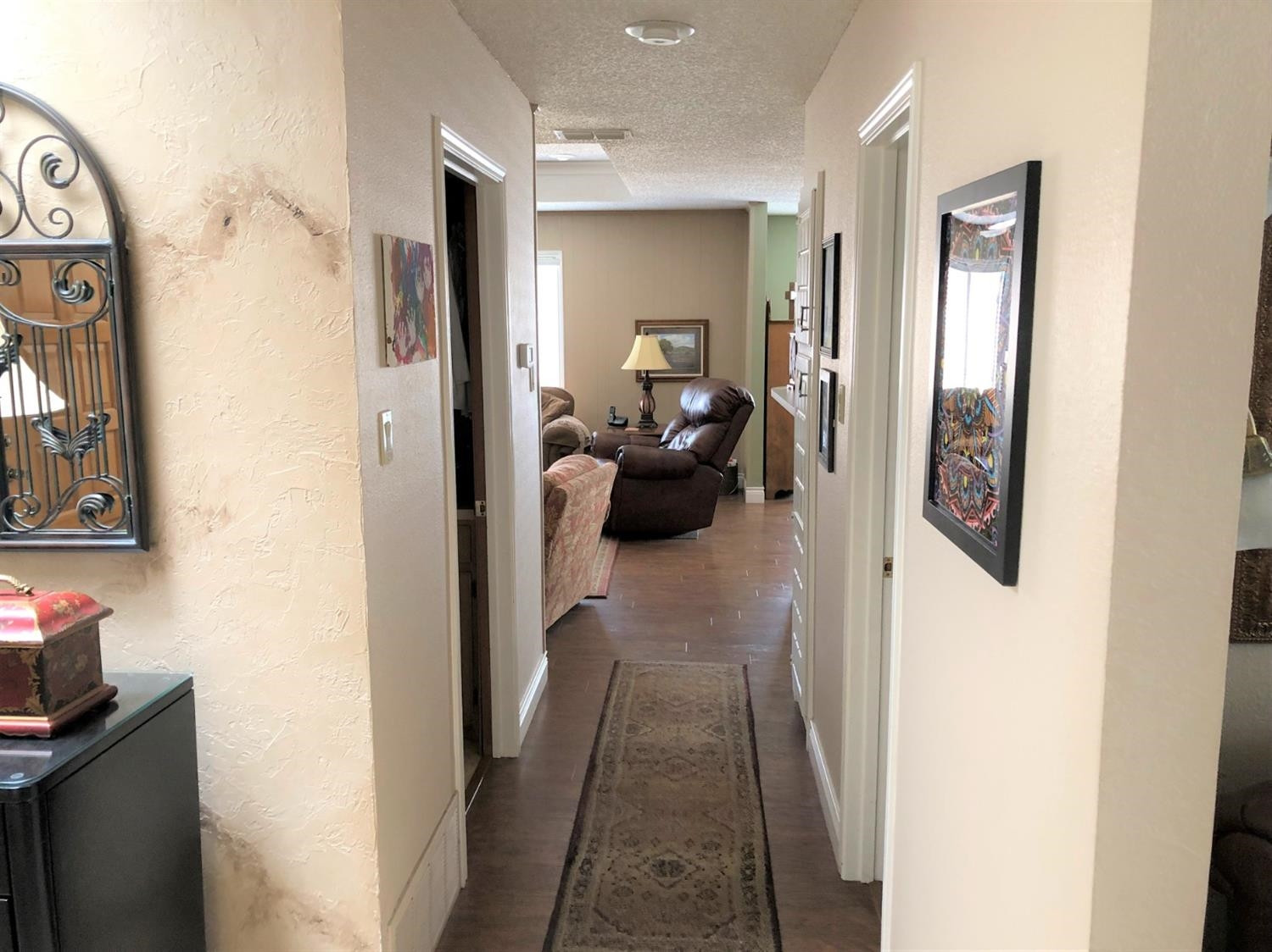 4018 88th Place Lubbock, TX 79423 - Photo 7 of 31 a en suite bathroom with a sink and mirror