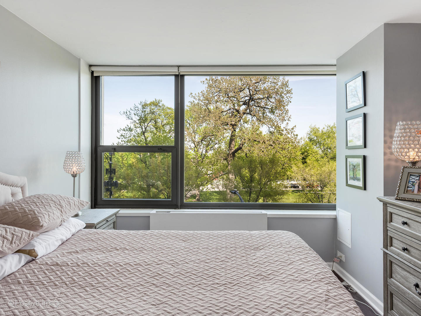 1850 North Clark Street, Unit 407 Chicago, IL 60614 - Photo 15 of 23 a bedroom with a bed and a window