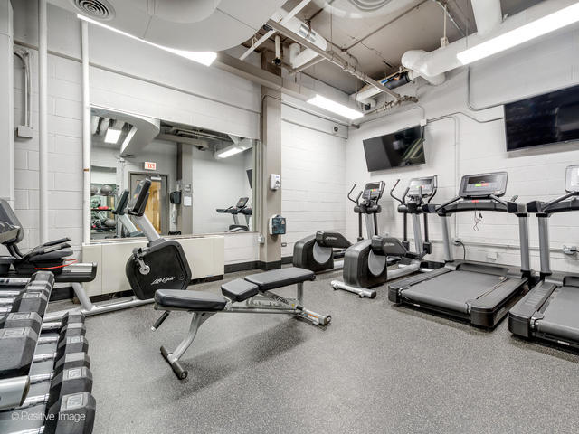1850 North Clark Street, Unit 407 Chicago, IL 60614 - Photo 23 of 23 a view of a room with gym equipment