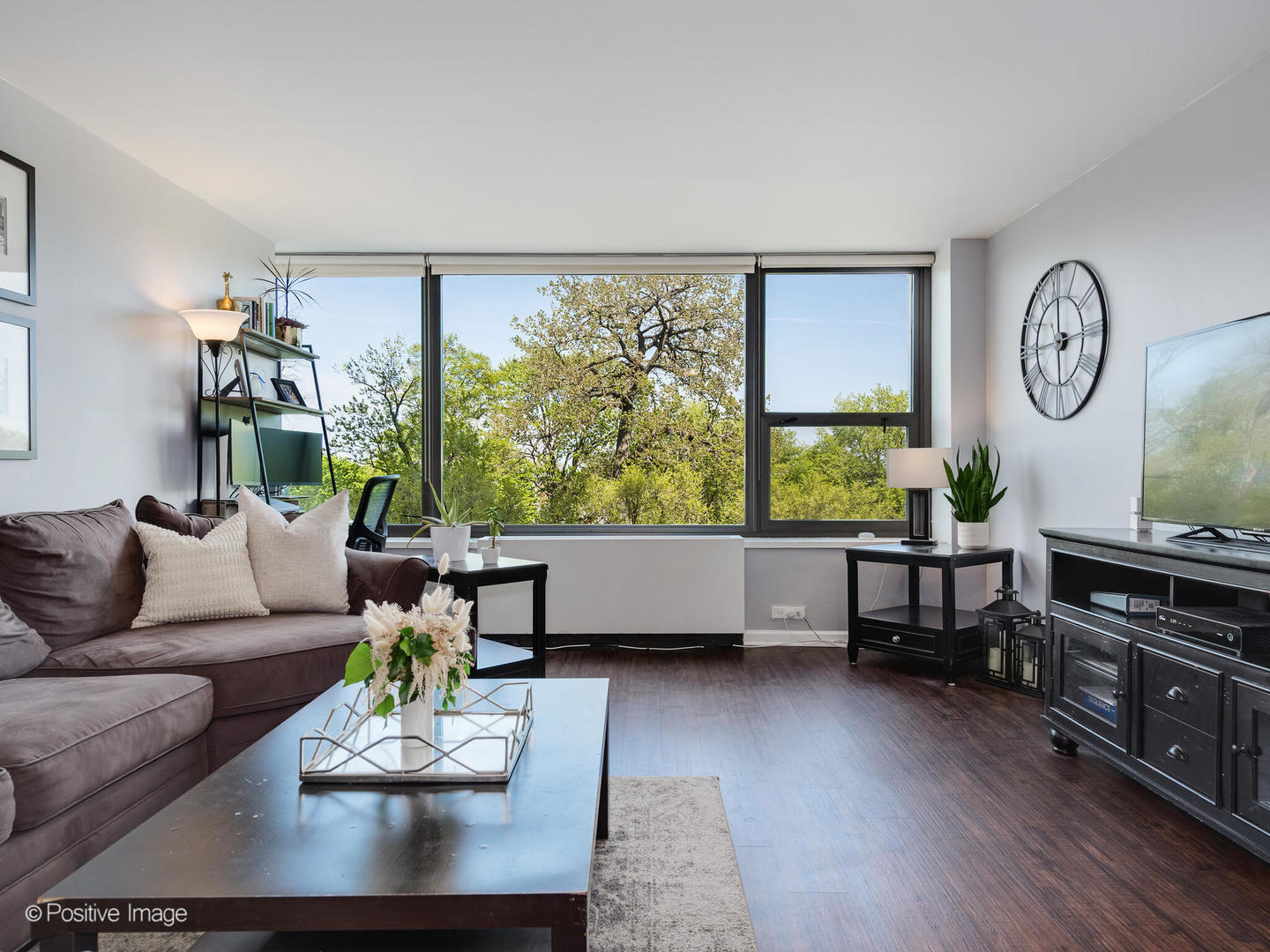 1850 North Clark Street, Unit 407 Chicago, IL 60614 - Photo 4 of 23 a living room with furniture window and wooden floor