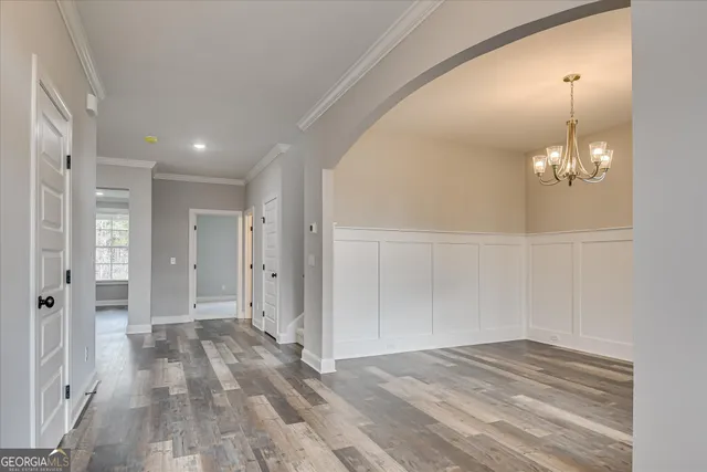 a large hall with lots of counter space and windows