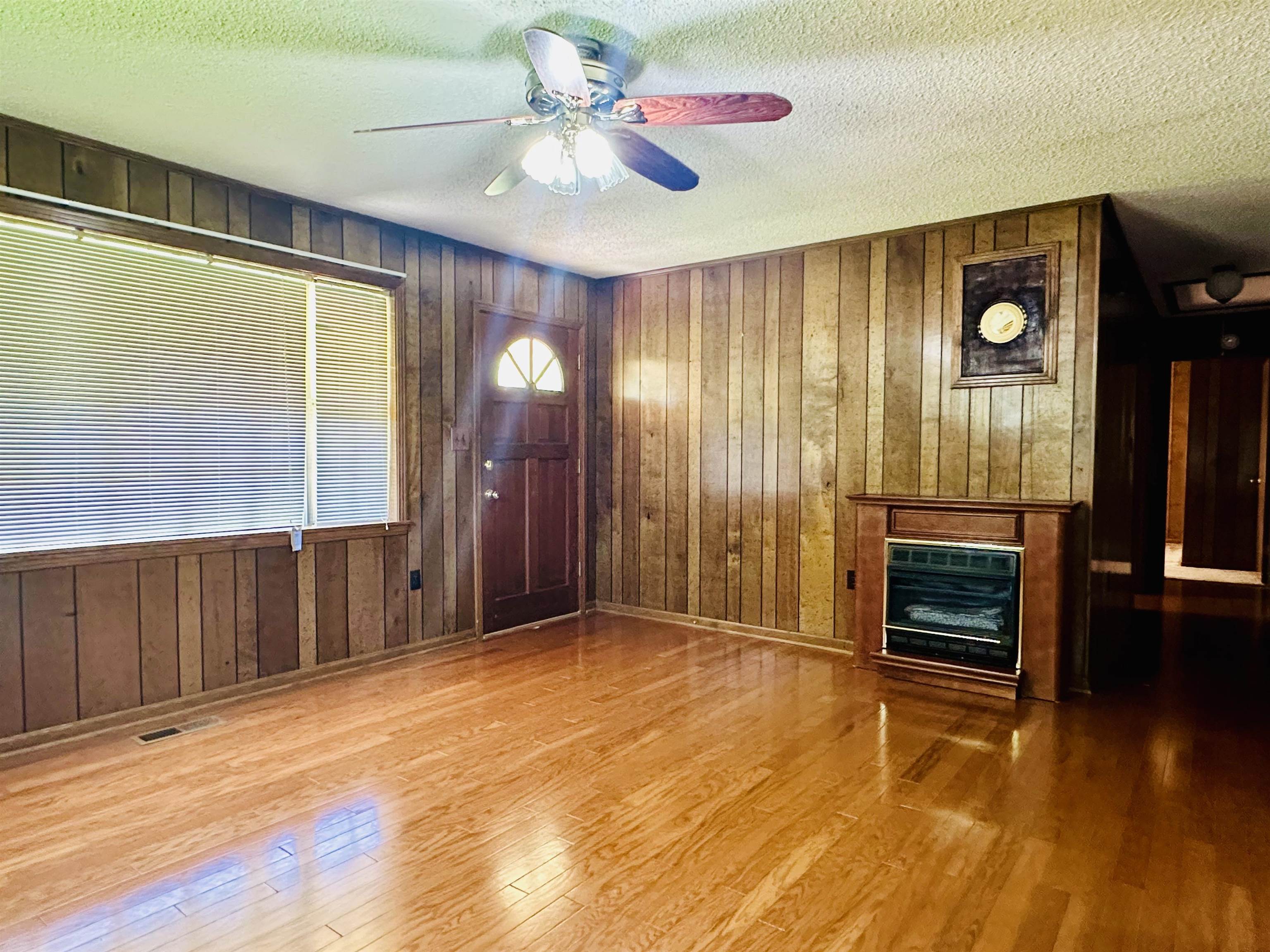 182 Wenasoga Road Ramer, TN 38367 - Photo 2 of 31 wooden floor in an empty room with a window