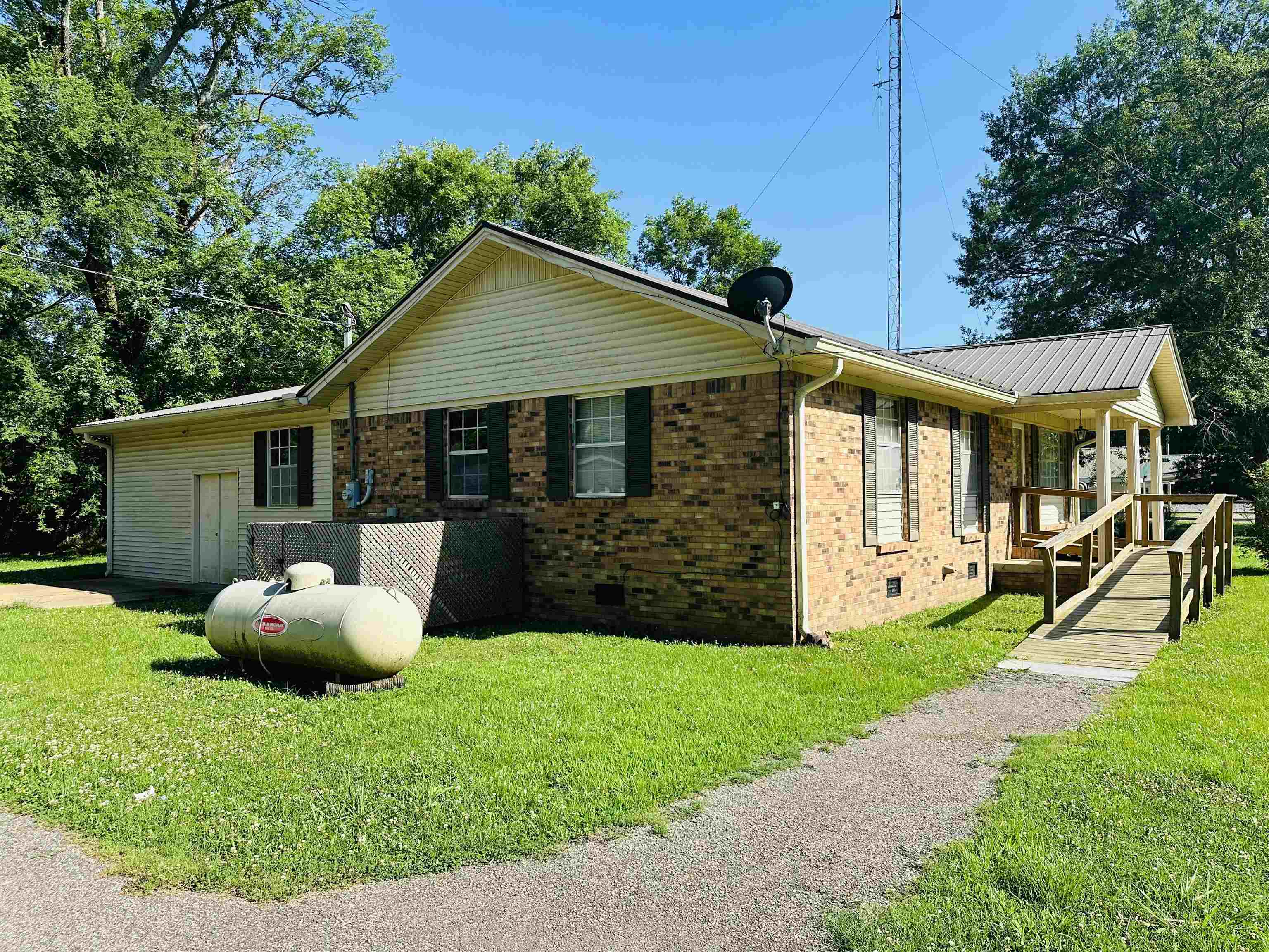 182 Wenasoga Road Ramer, TN 38367 - Photo 25 of 31 a view of a house with backyard