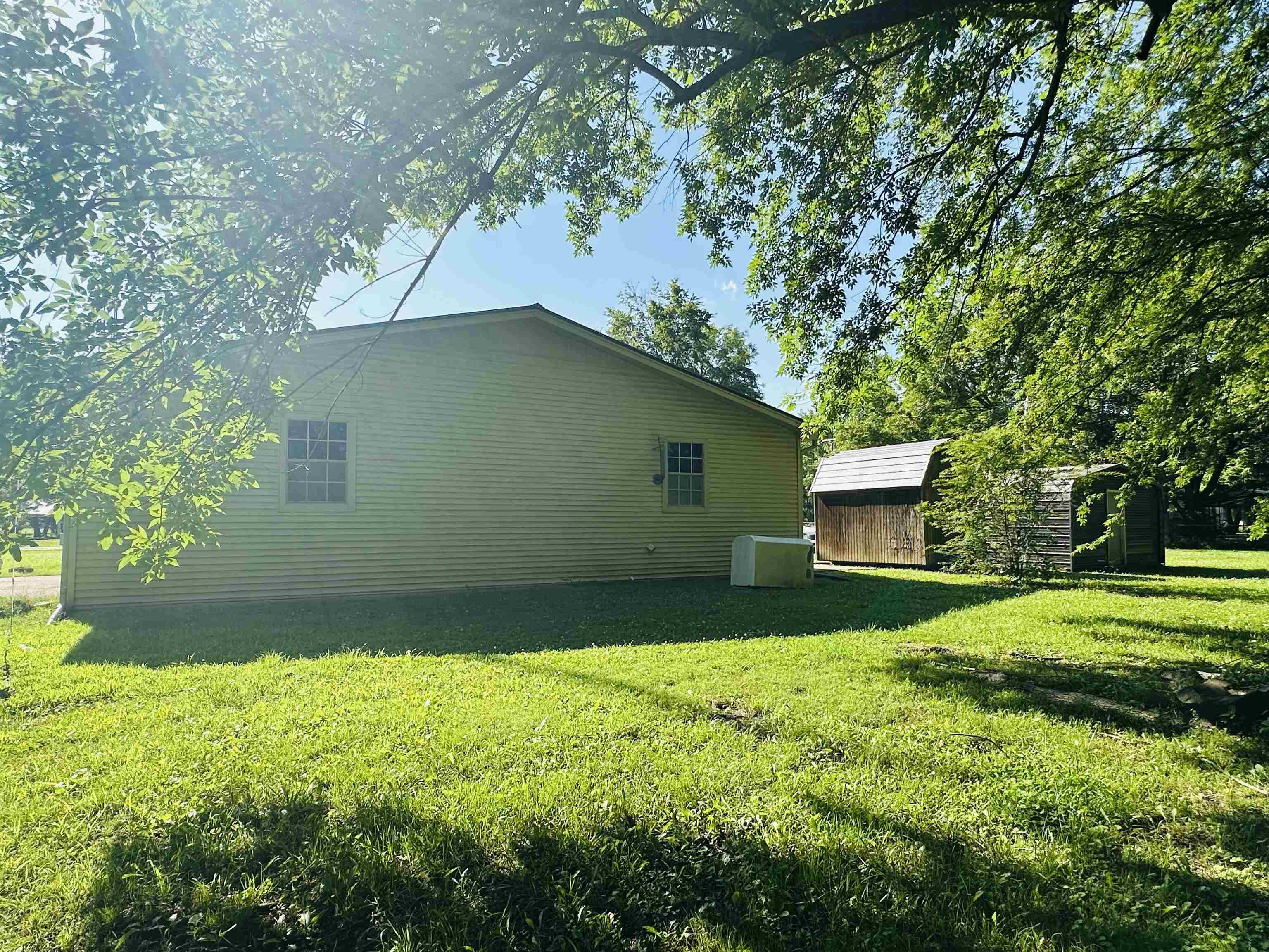 182 Wenasoga Road Ramer, TN 38367 - Photo 30 of 31 a backyard of a house