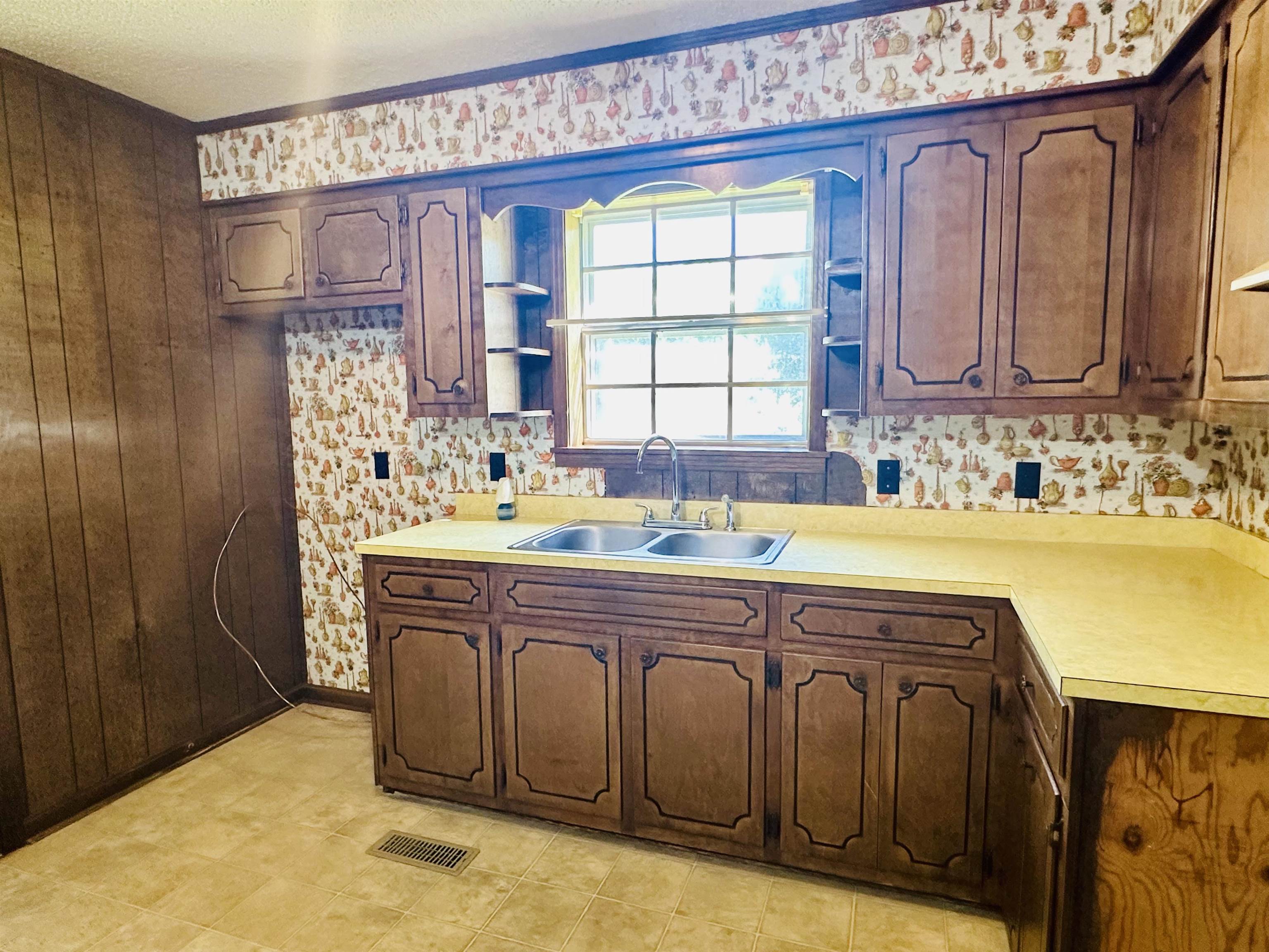 182 Wenasoga Road Ramer, TN 38367 - Photo 9 of 31 a spacious bathroom with a sink a mirror and a bathtub